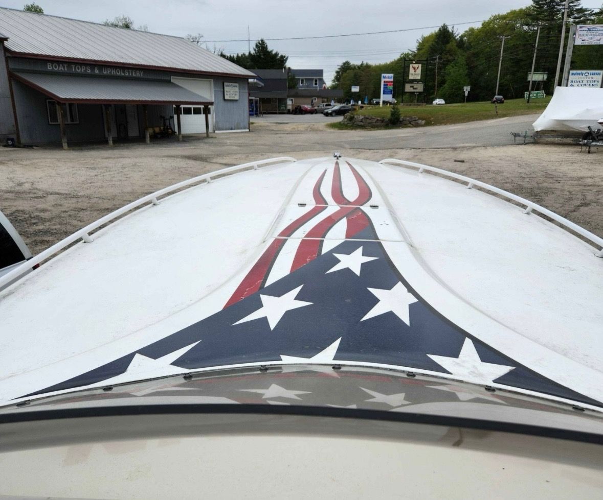 Fountain Fever 2000 boat with patriotic design on deck.