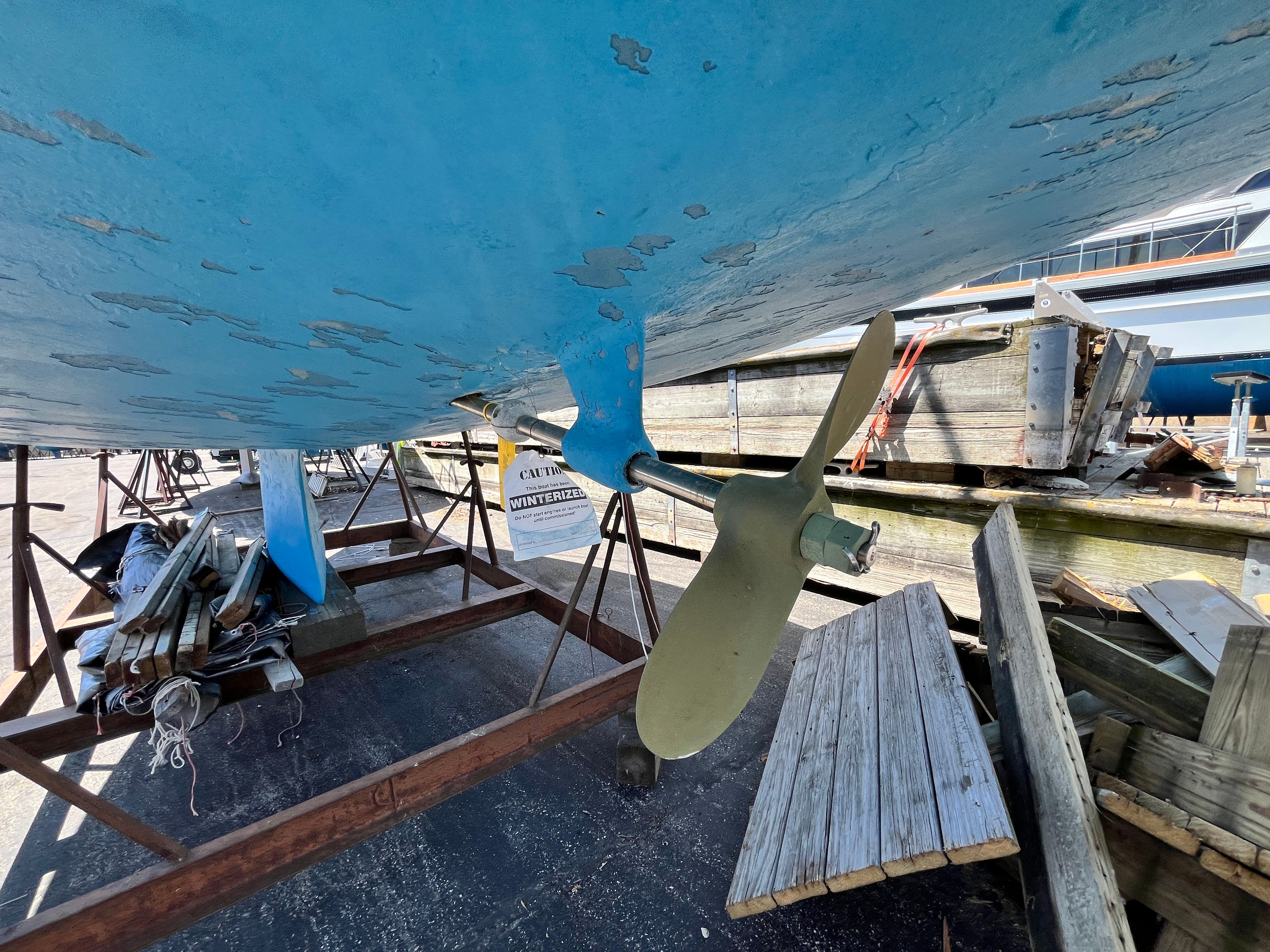 Propeller of a 1974 Capital Newport 30 MKII sailboat in dry dock.