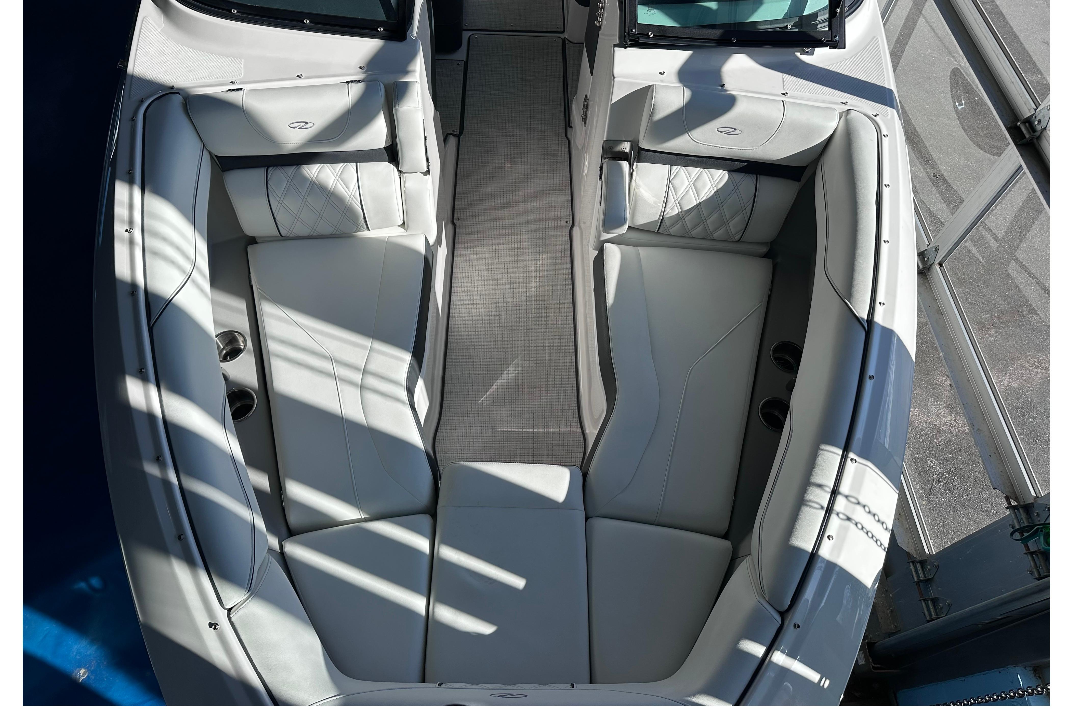 2026 Regal LX4 boat interior with luxurious white seating and modern design.