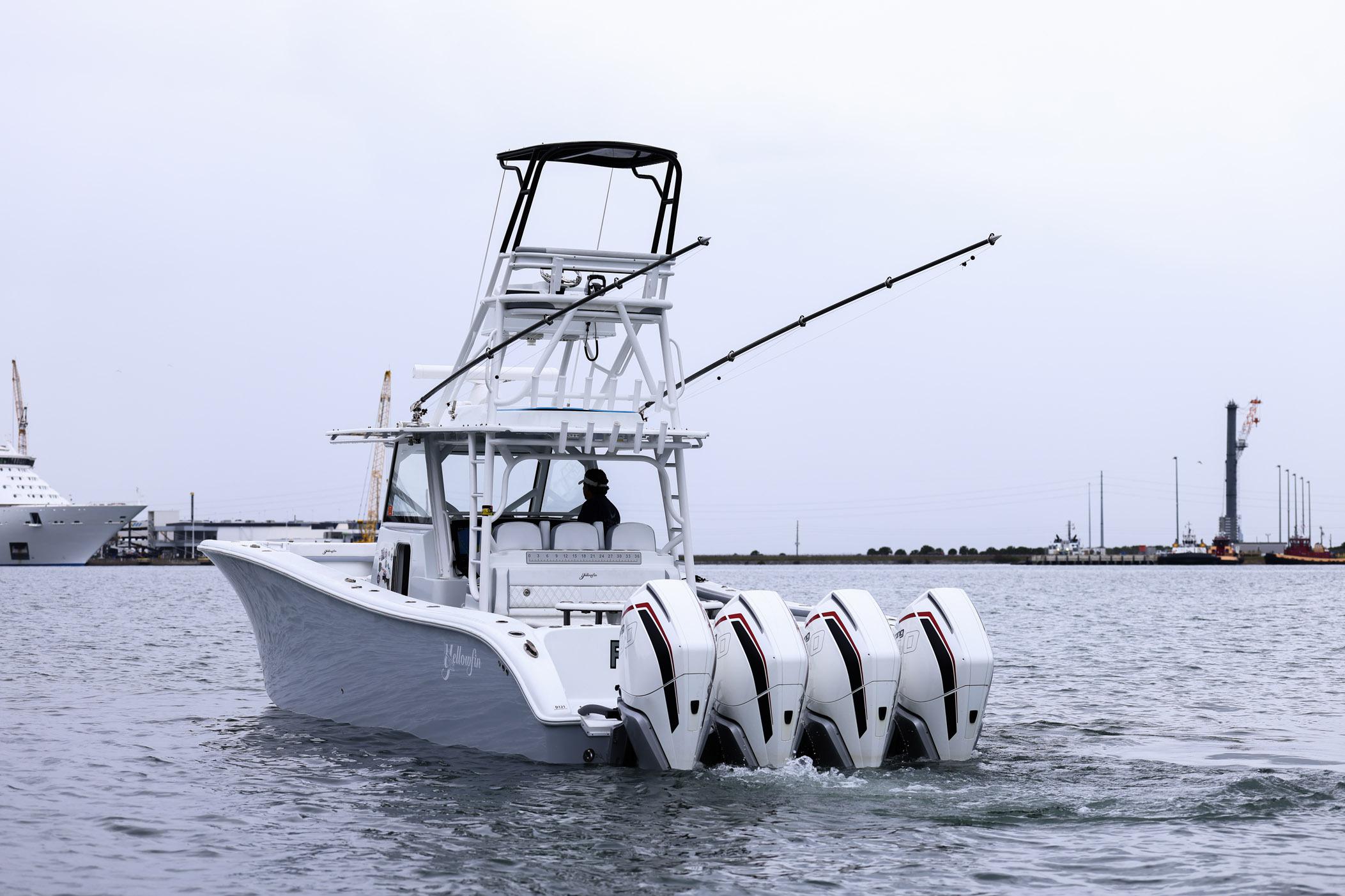 2020 Yellowfin 42 Offshore boat with four engines on open water.