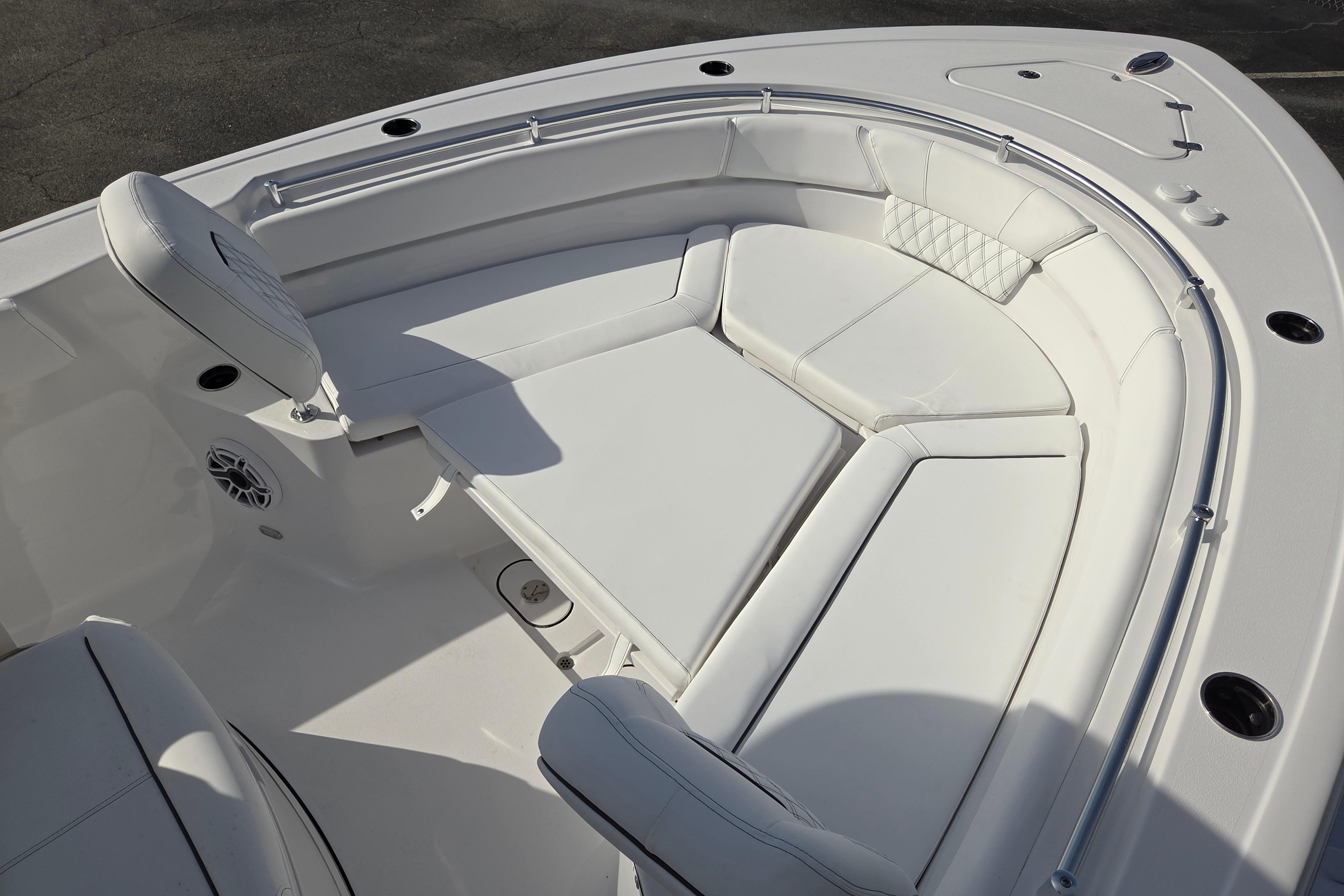 2026 Sportsman Heritage 261 Center Console boat with luxurious white seating area.