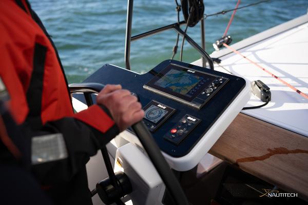 Helm of 2025 Nautitech 48 Open catamaran with navigation controls and display.