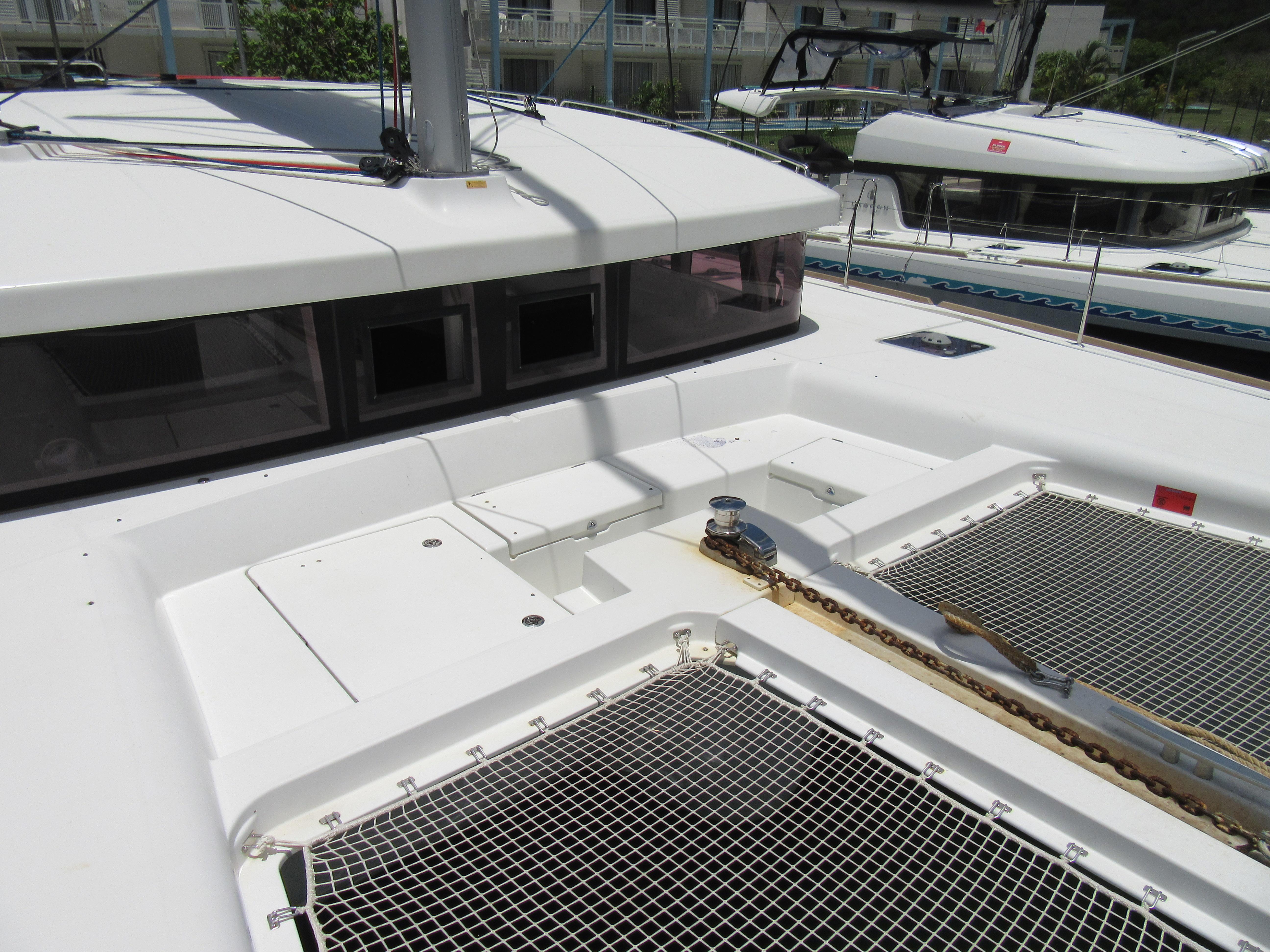 2018 Lagoon 450S catamaran deck with netting and anchor chain.