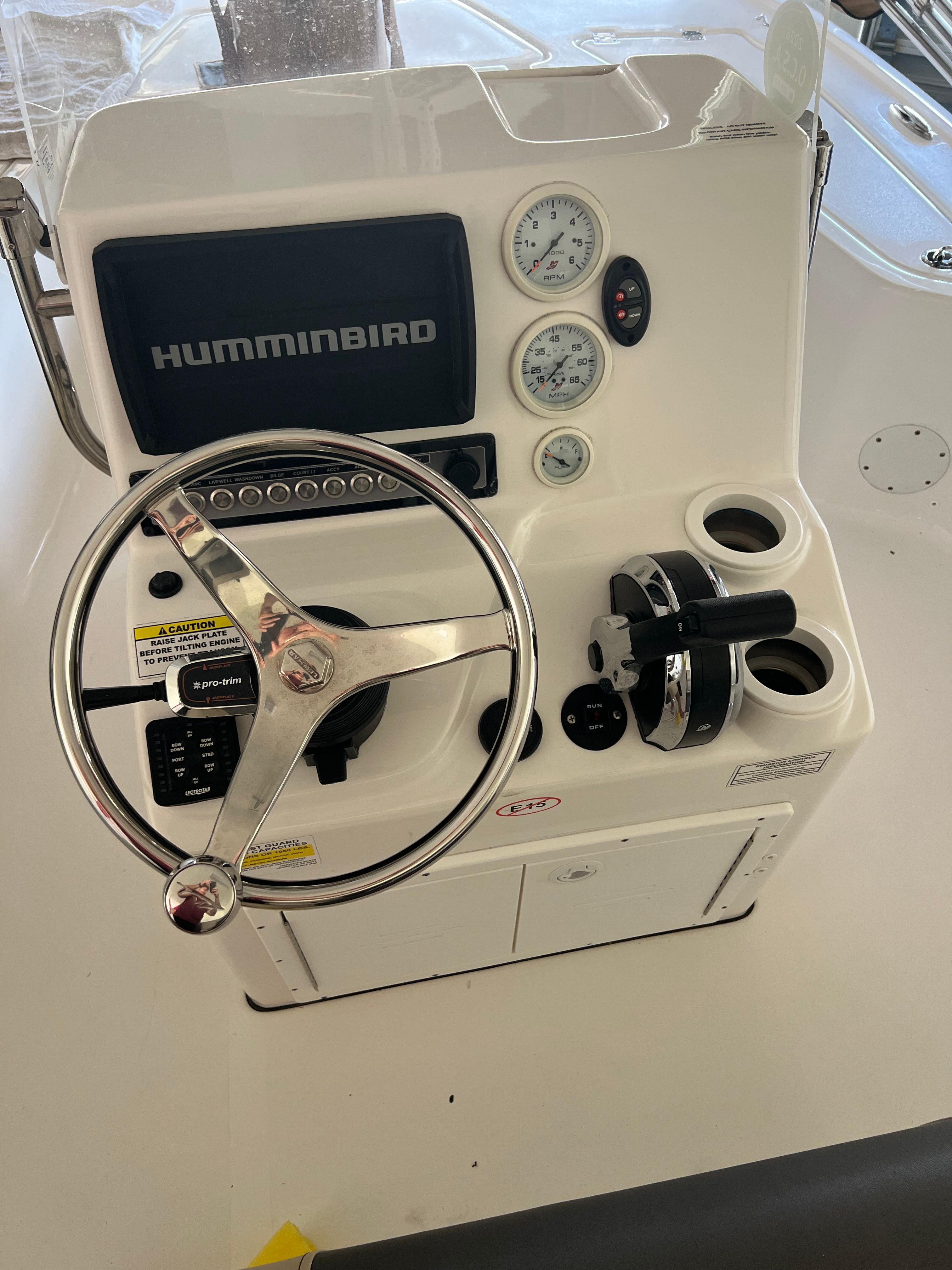 The image shows the helm of a 2021 Tidewater 1910 Bay Max boat with a Humminbird system.