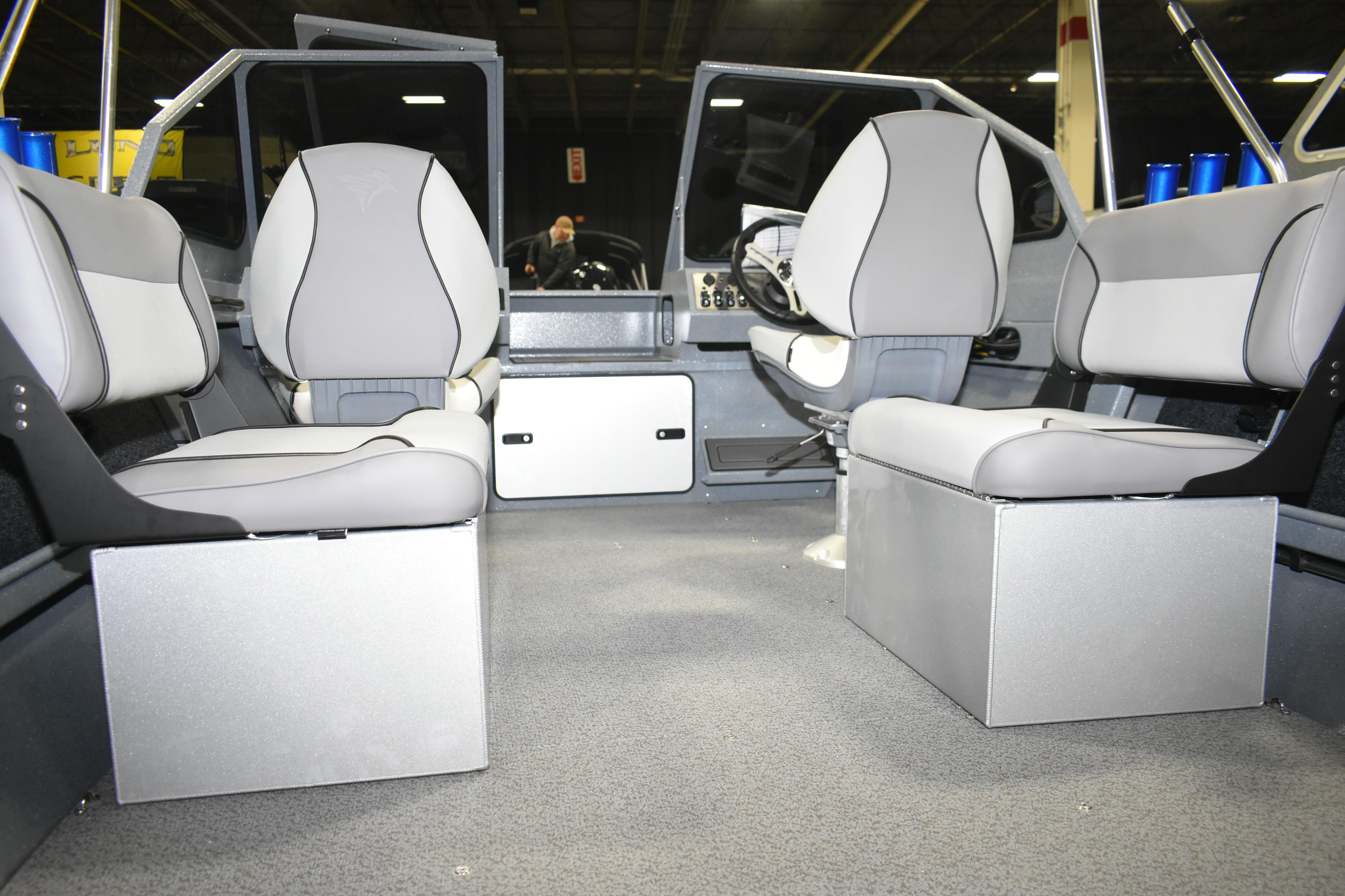 Interior of 2026 KingFisher 1825 Falcon boat with modern seating and steering console.