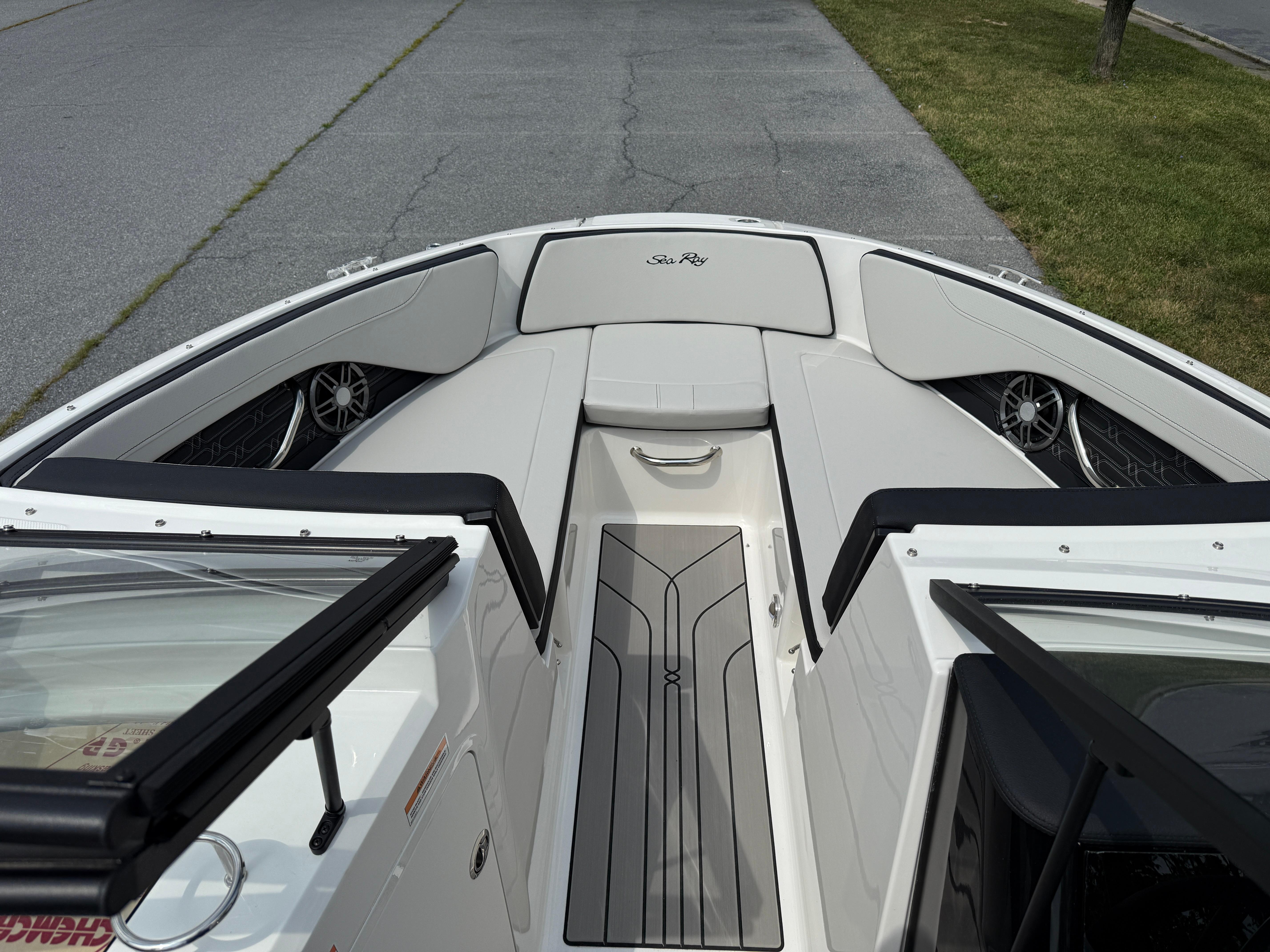 2026 Sea Ray SPX 210 Outboard boat interior with sleek seating and modern design.