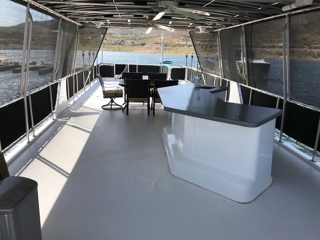 Interior of a 2006 Summersun Houseboats 16x68 with bar and seating area.