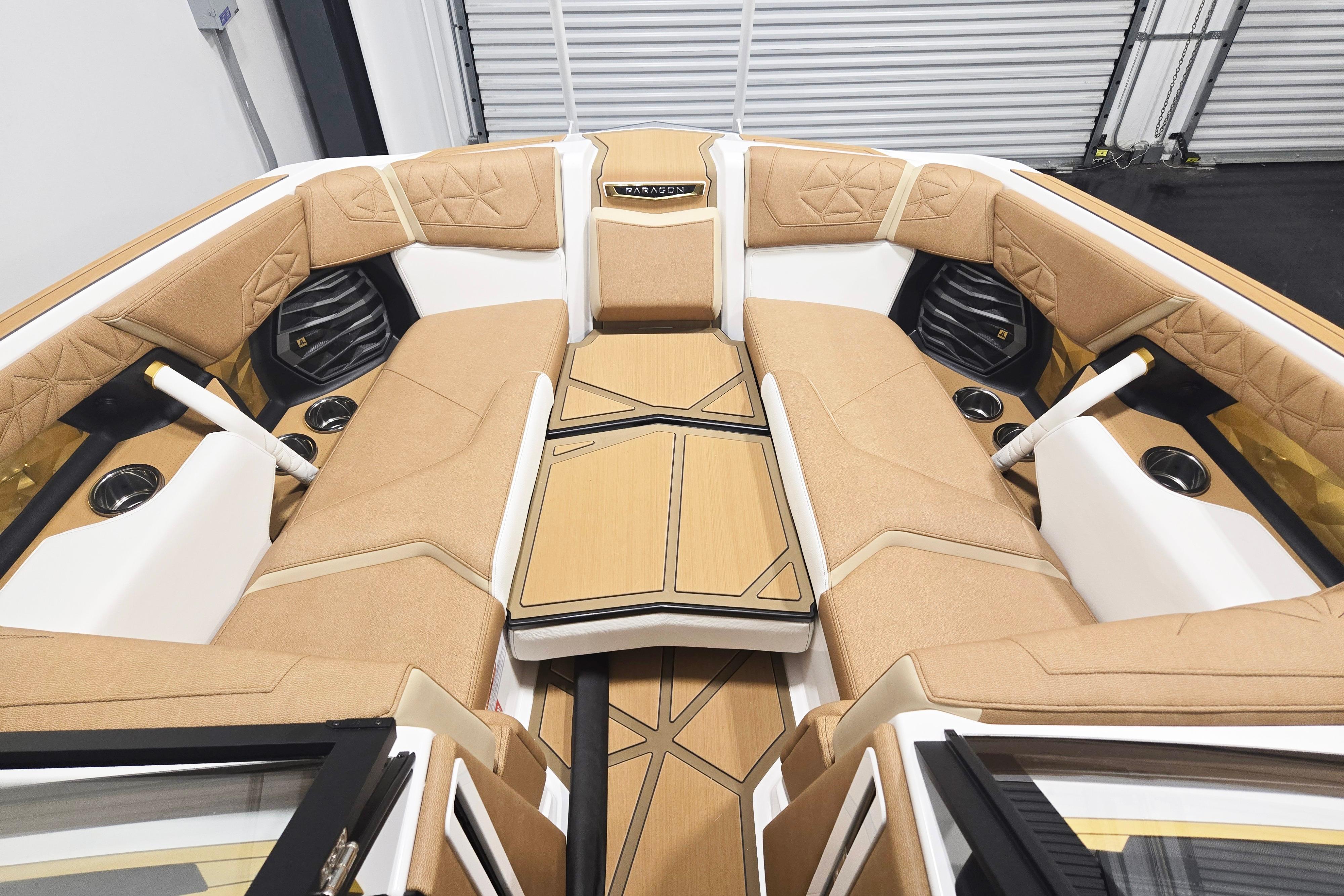 2026 Nautique Super Air Nautique G23 Paragon interior with luxurious tan seating and modern design.