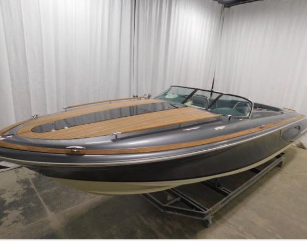 2021 Chris-Craft Corsair 34 boat in a showroom.