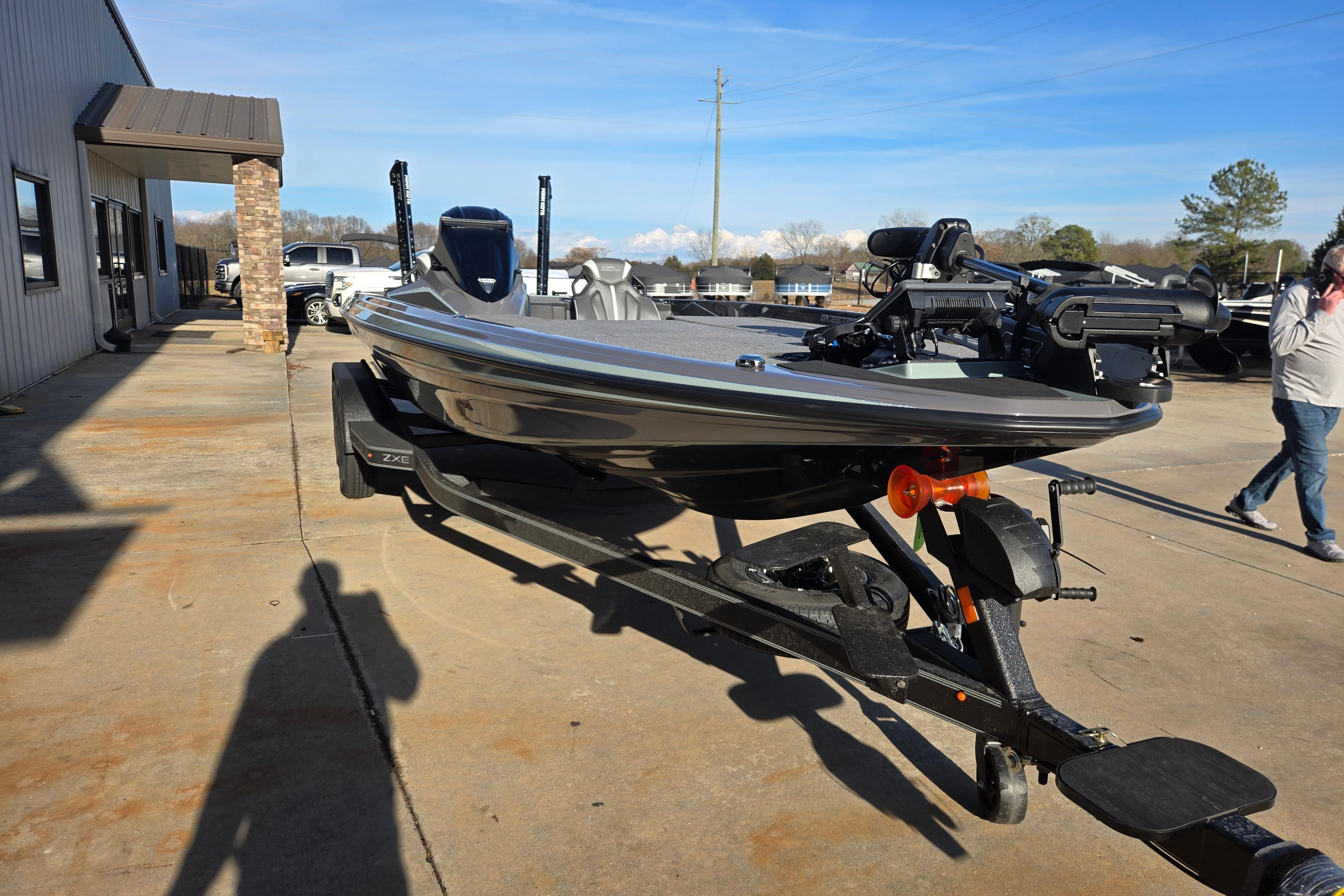 2026 Skeeter ZXE21 boat on trailer in outdoor dealership lot.