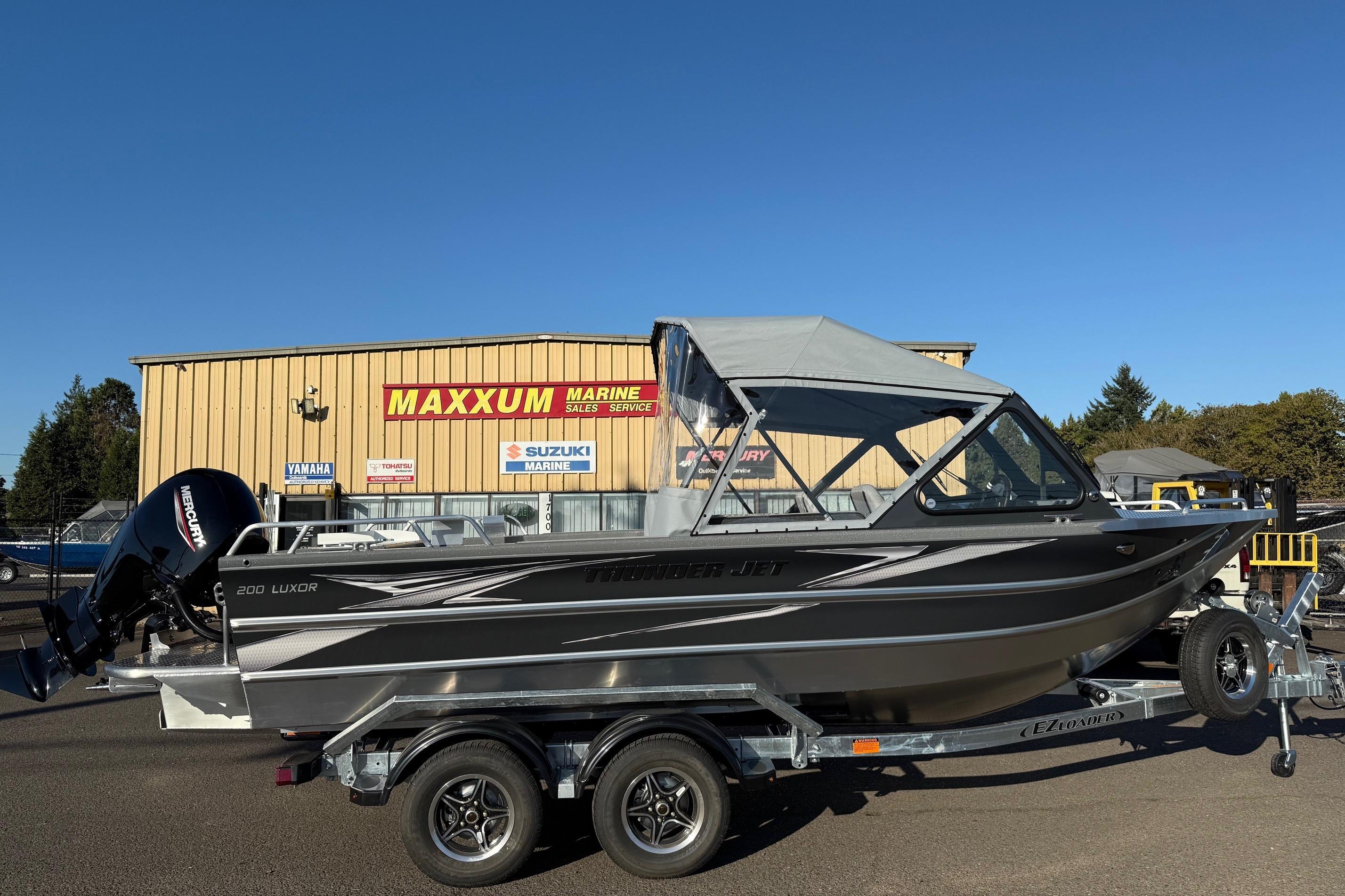 2026 Thunder Jet 200 Luxor boat on trailer at Maxxum Marine dealership.