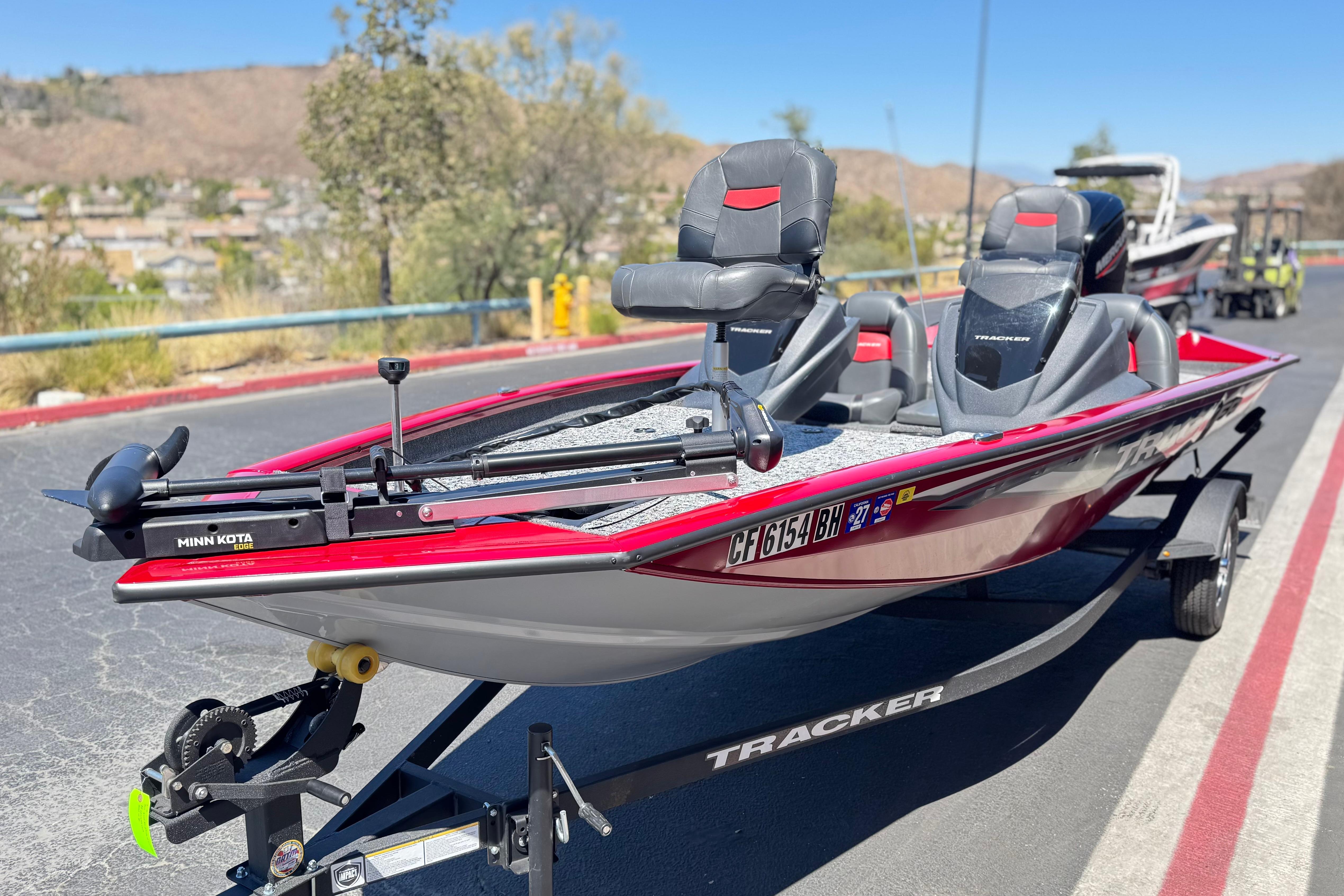 2025 Tracker Pro Team 175 TXW fishing boat on trailer, featuring Minn Kota trolling motor.