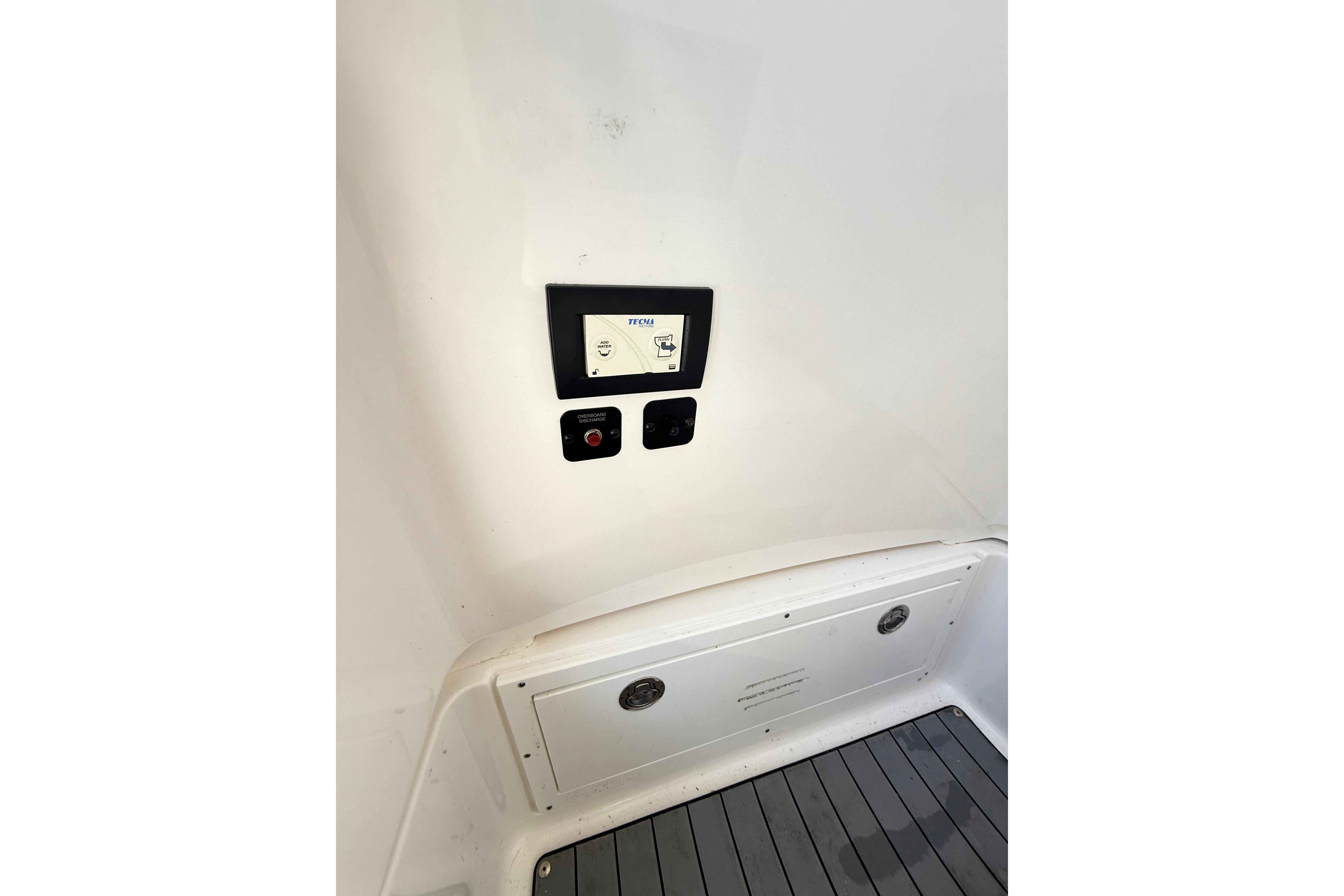 2023 Caymas 281 HB boat interior control panel and flooring.