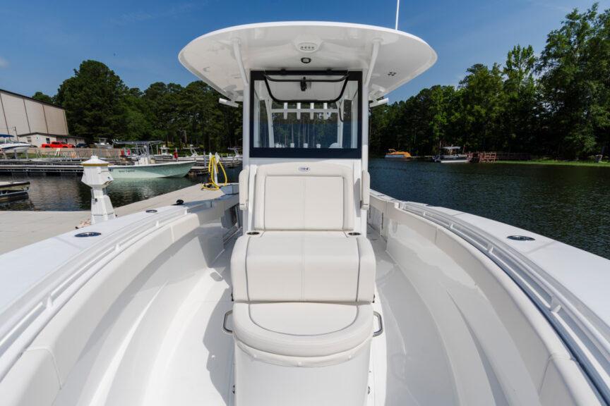 Manufacturer Provided Image: 2026 Sea Hunt Gamefish 30 Coffin Box boat docked by a serene lake.