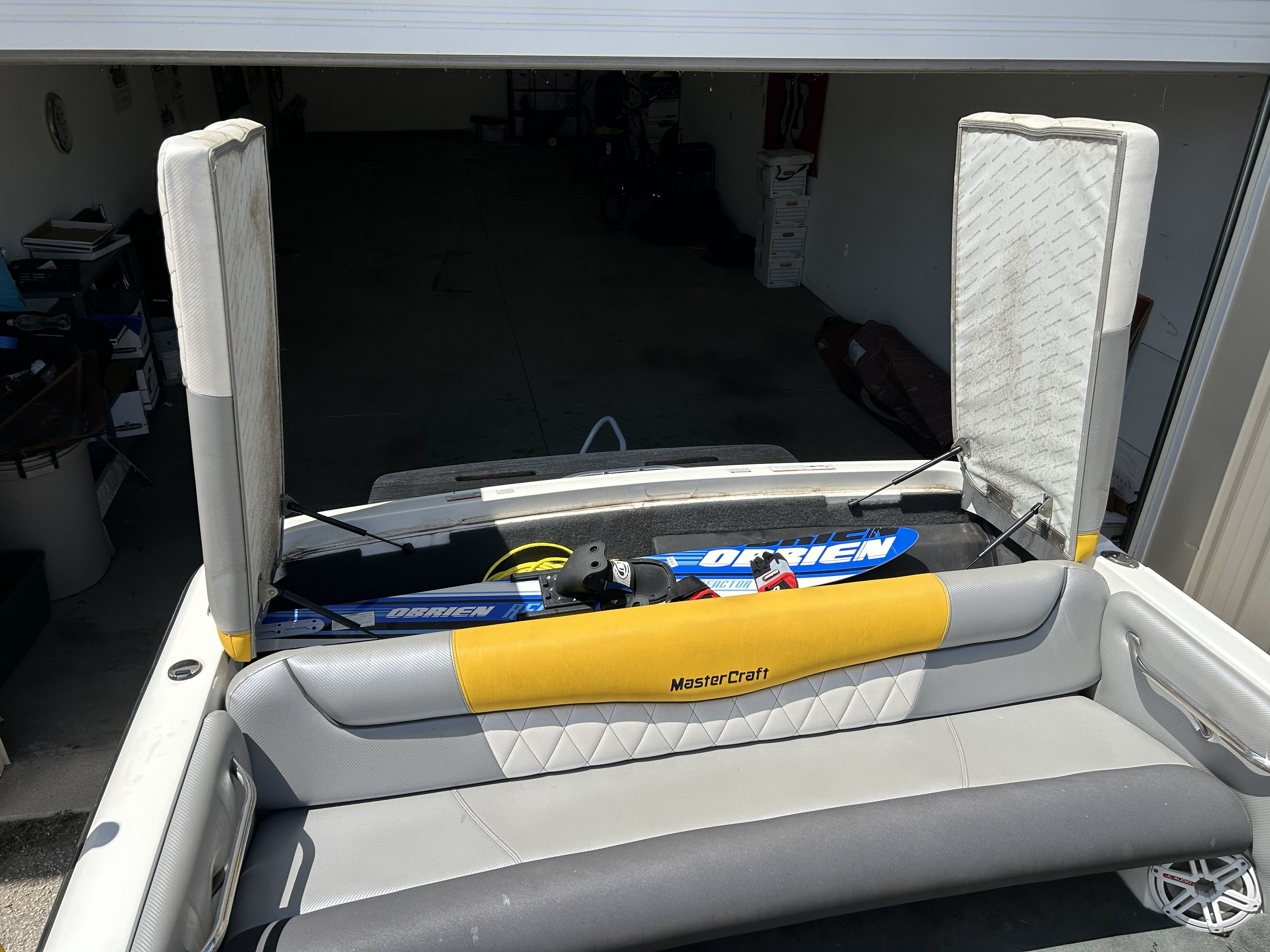Interior view of a 2011 MasterCraft PS197 boat with water skis.
