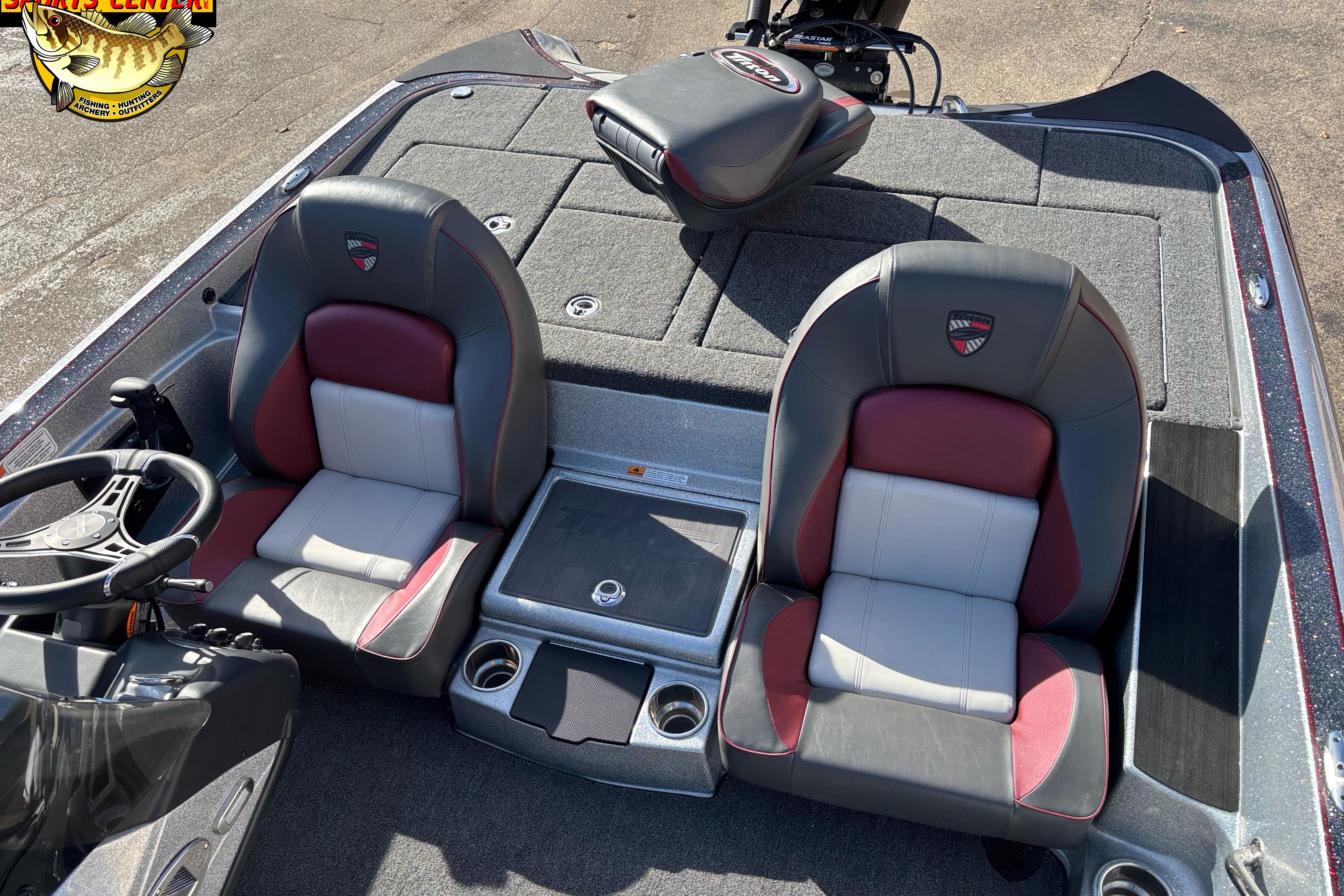 2025 Triton 18 TrX boat interior with dual seats and steering wheel.
