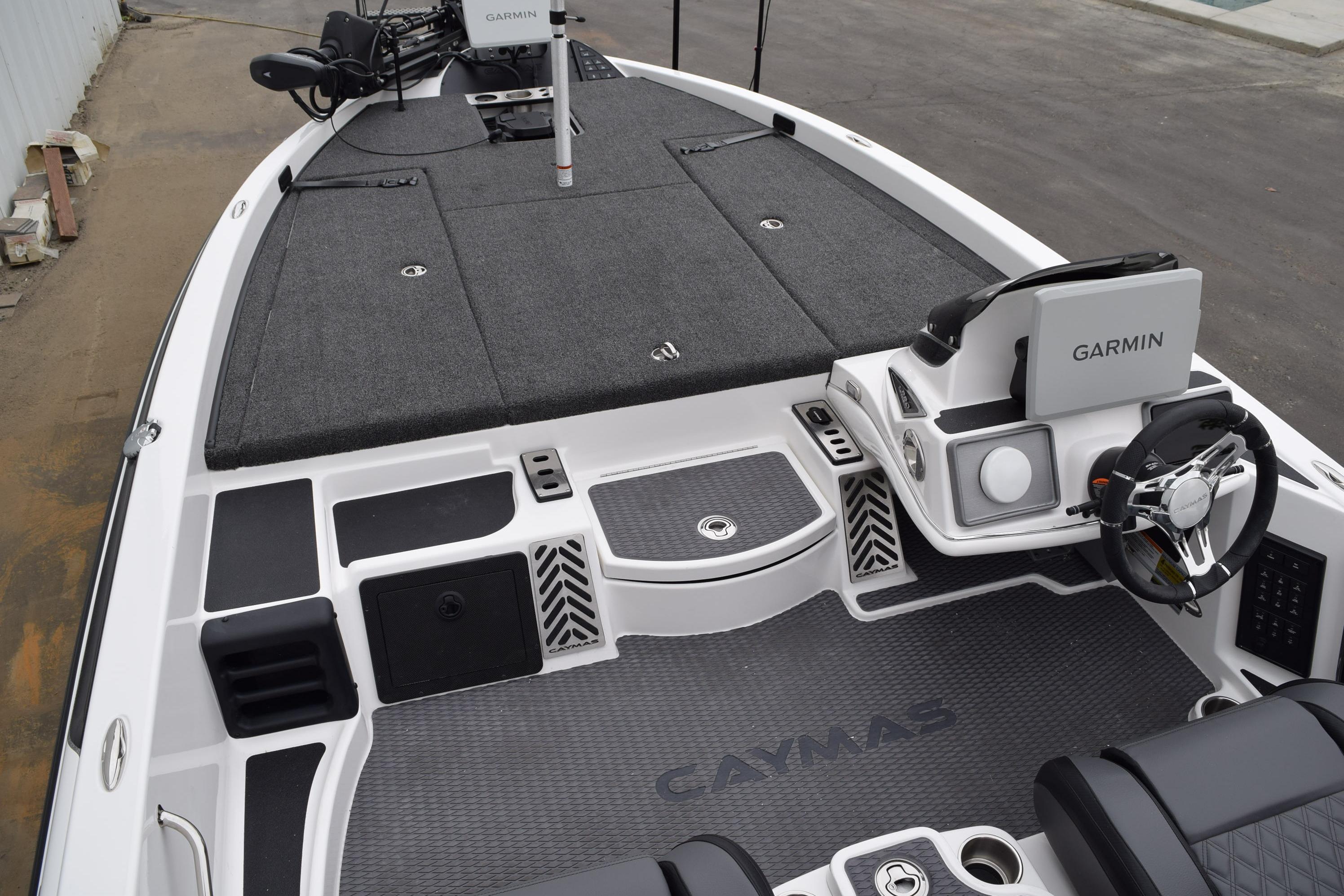 2027 Cayams CX 20 Pro boat interior with Garmin navigation system and spacious deck.
