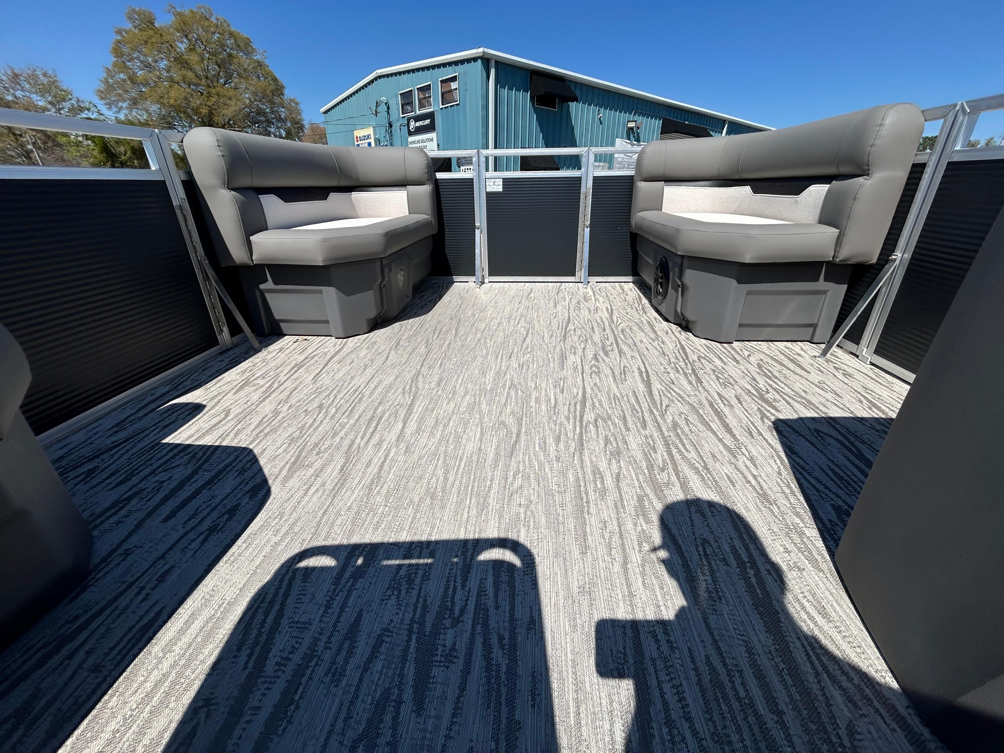 Interior of 2025 Armada Z-168 boat with gray seating and textured flooring.