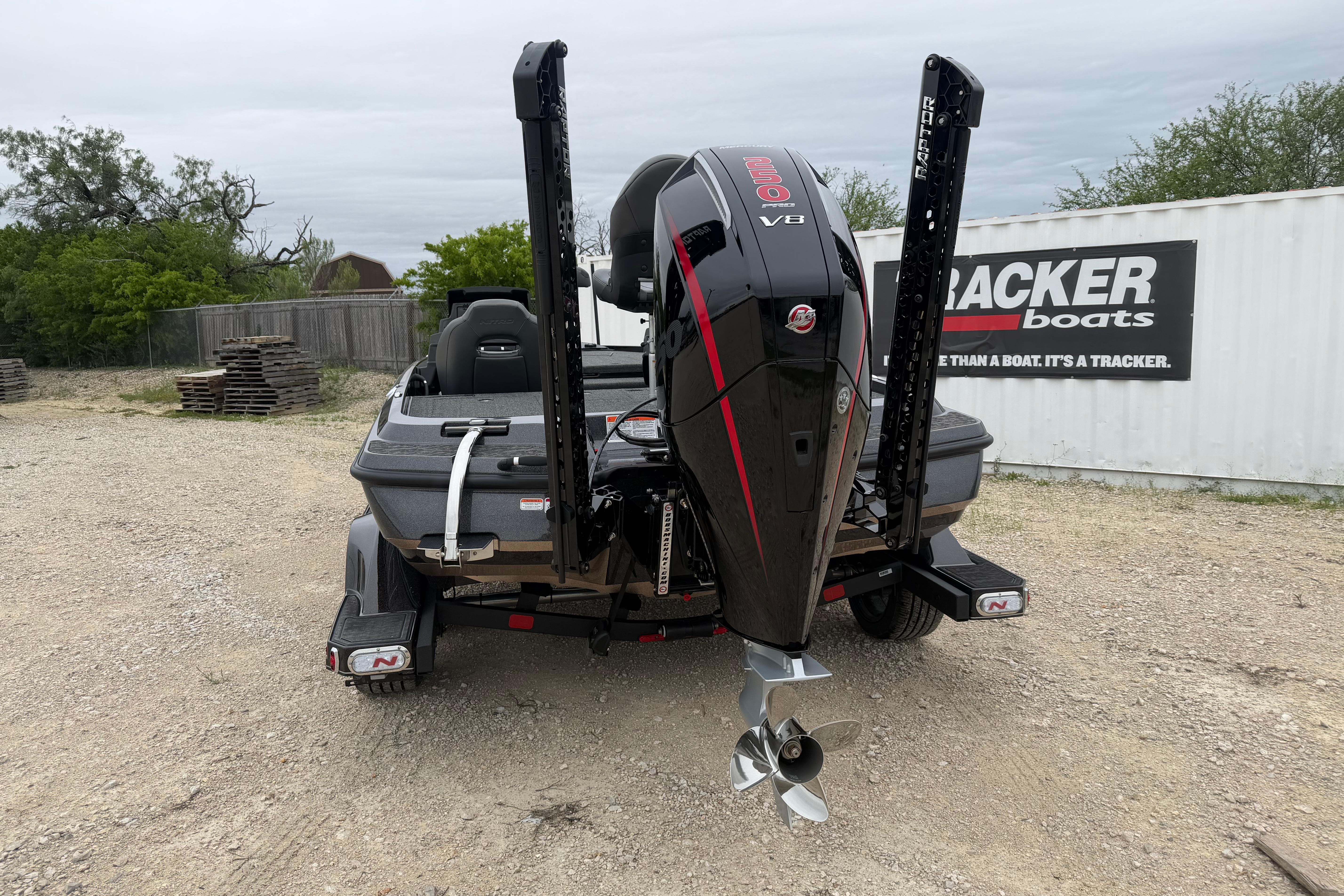2026 Nitro Z21 XL Pro boat with powerful V8 engine, parked outdoors.