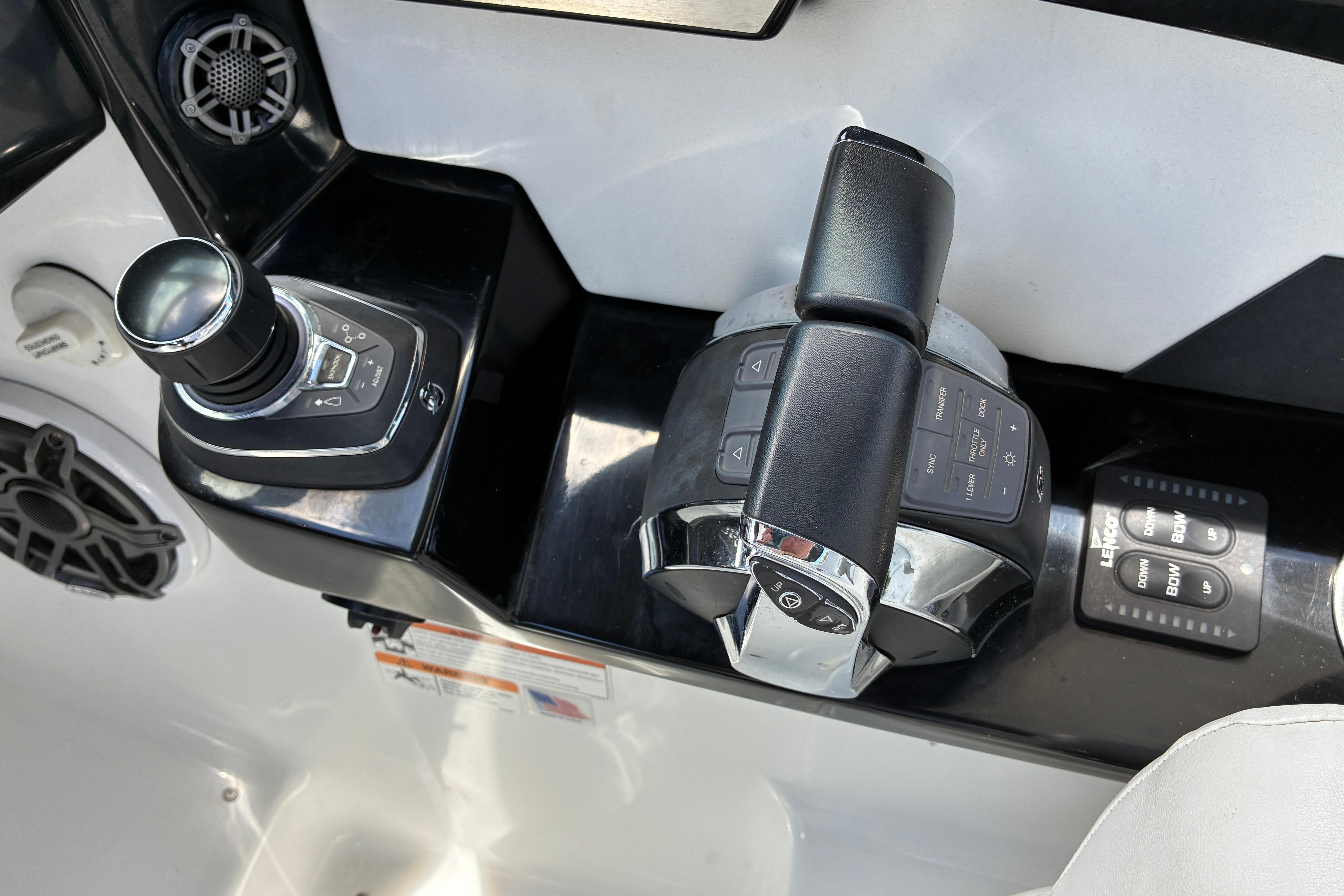 Control panel of 2020 Four Winns H290 OB boat with joystick and throttle controls.