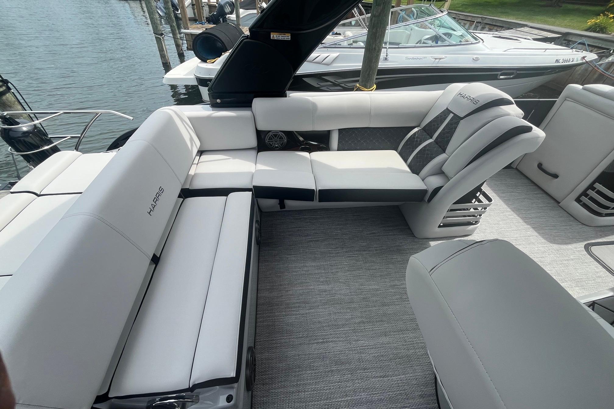 2024 Harris Grand Mariner 250 pontoon boat interior with luxurious seating and modern design.