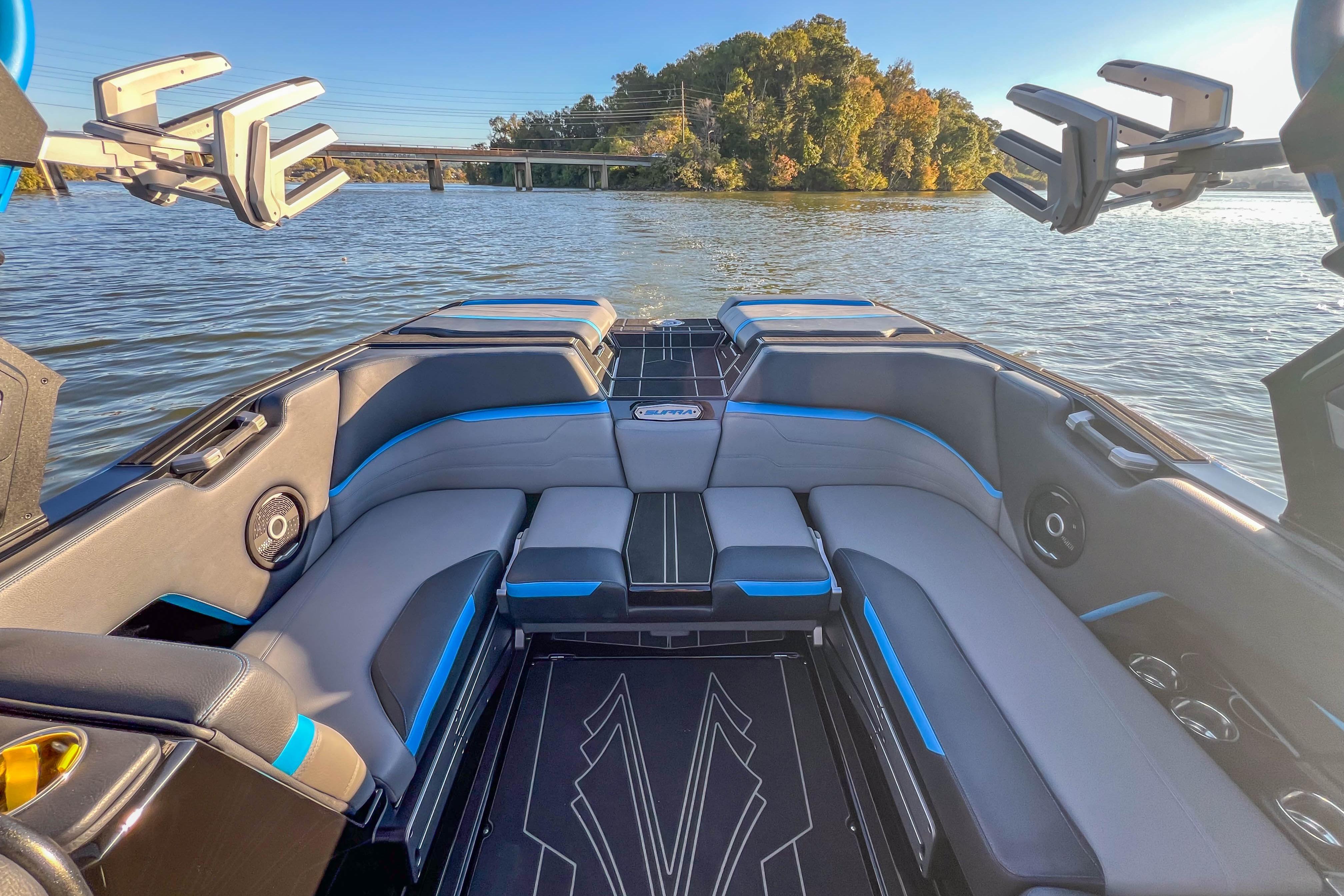 2024 Supra SV 400 boat interior with sleek seating and water view.