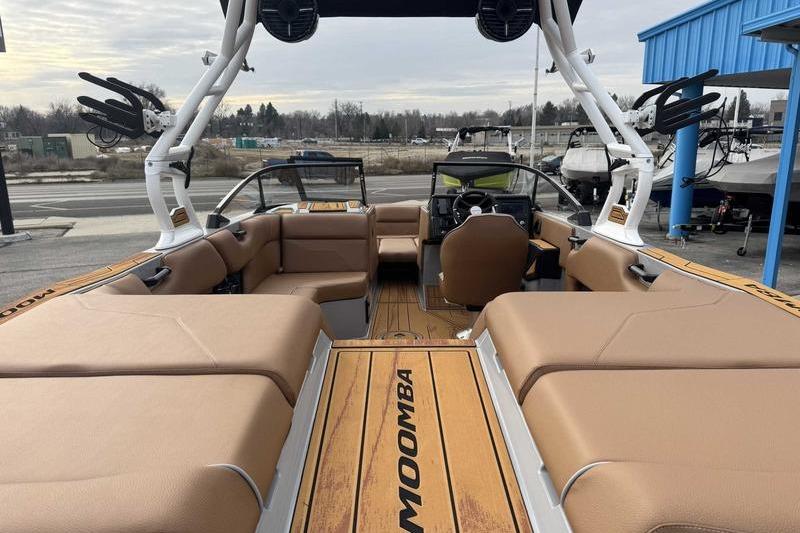 2026 Moomba Max boat interior with tan seating and sleek design.