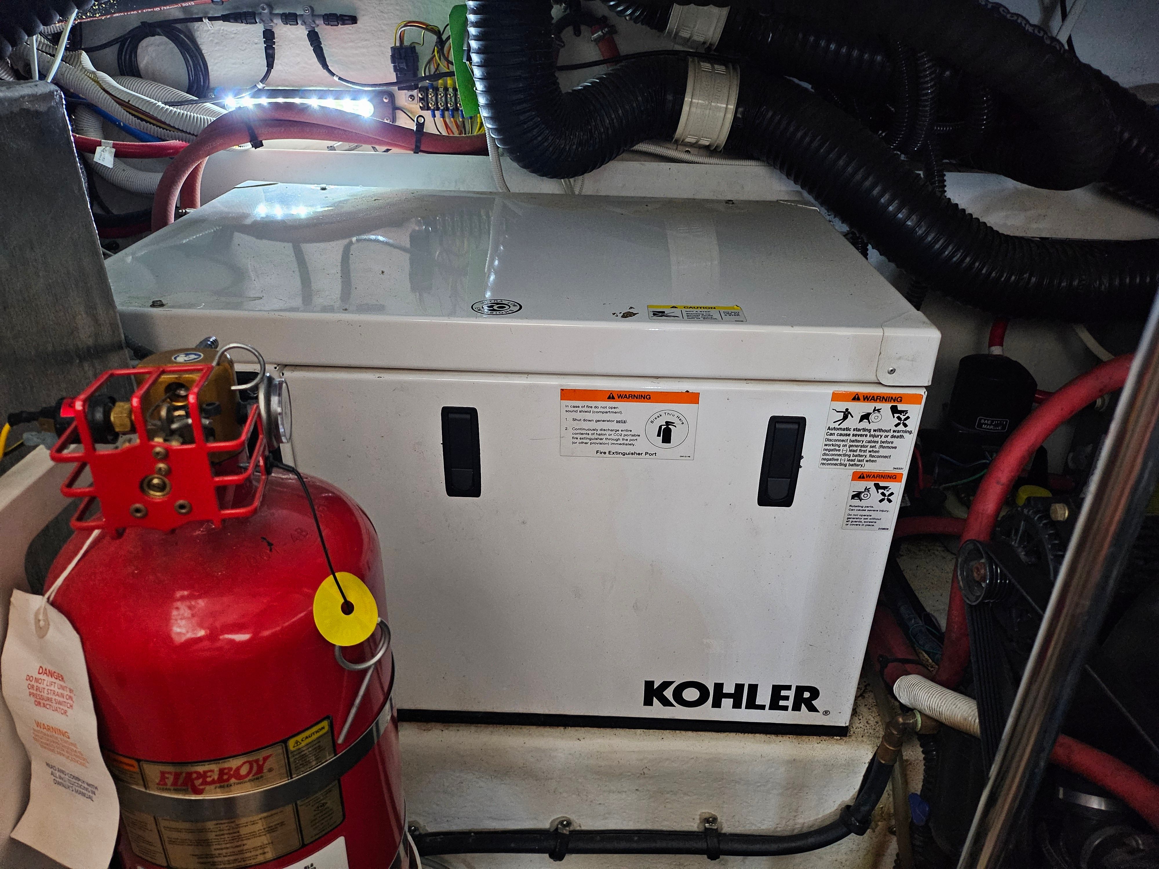 Kohler generator in engine room of 2014 Chaparral 330 Signature.
