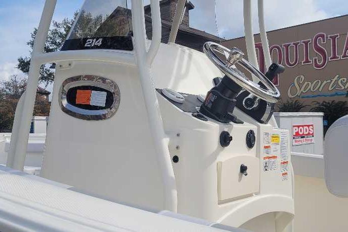 2026 Mako 214 Center Console boat dashboard with steering wheel and controls.