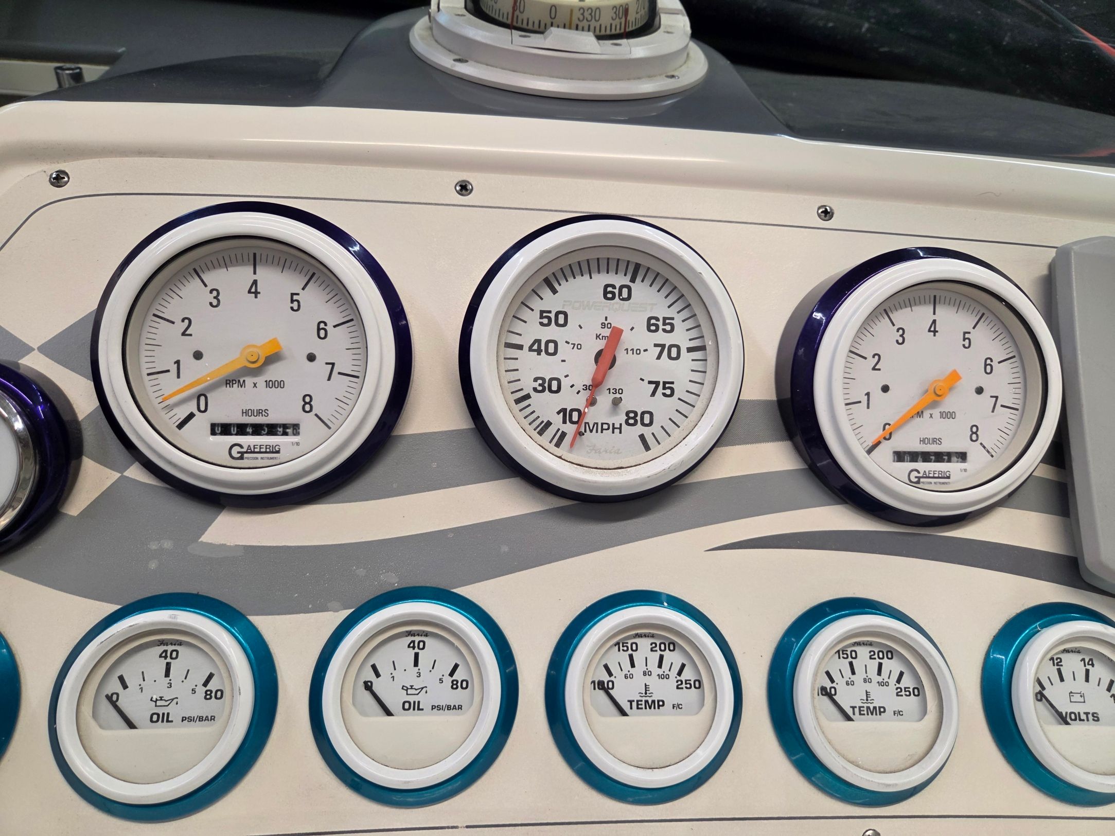Dashboard of a 1998 Powerquest Enticer 290 FX with various gauges.
