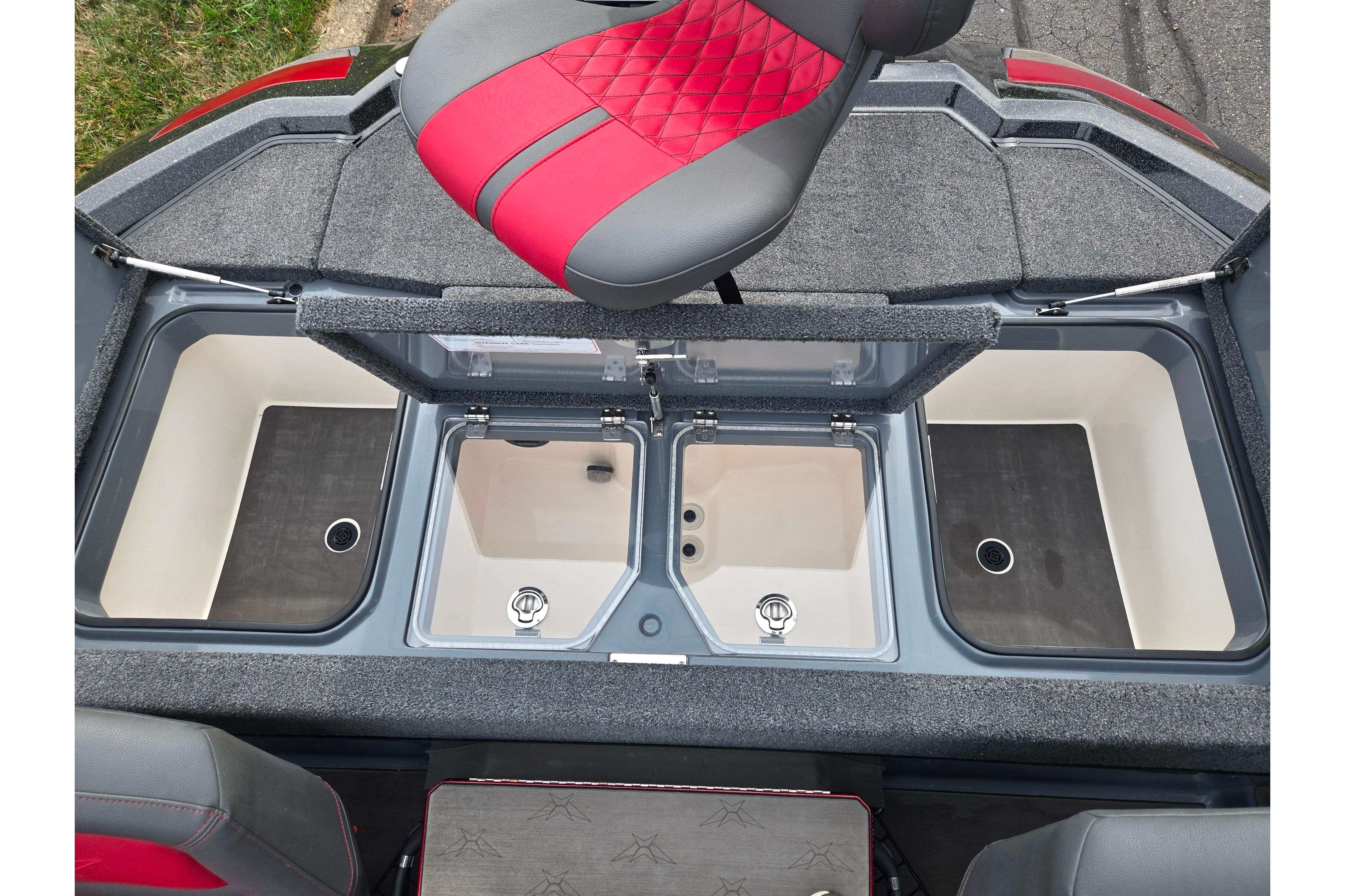 2022 Vexus VX20 boat interior with open storage compartments and red-gray seating.