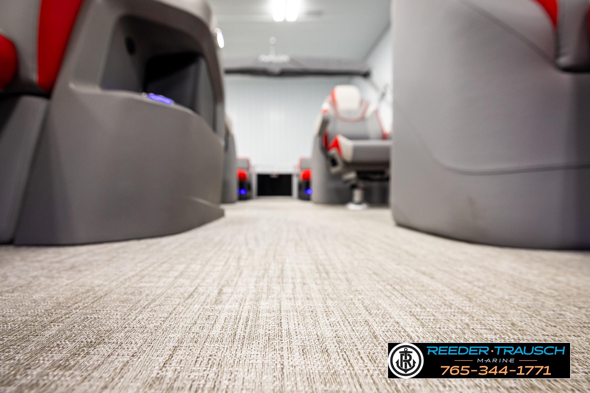 Interior view of 2026 Avalon LSZ QL boat with modern seating and carpet flooring.