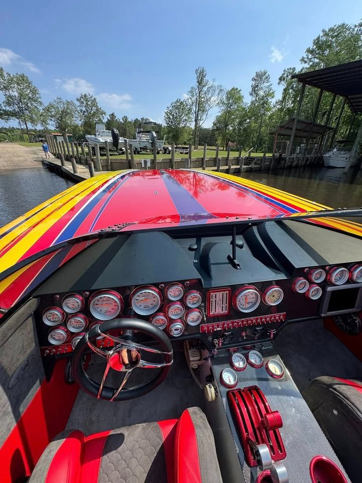 Interior view of a 2003 Skater 40 S.S. boat with colorful dashboard.