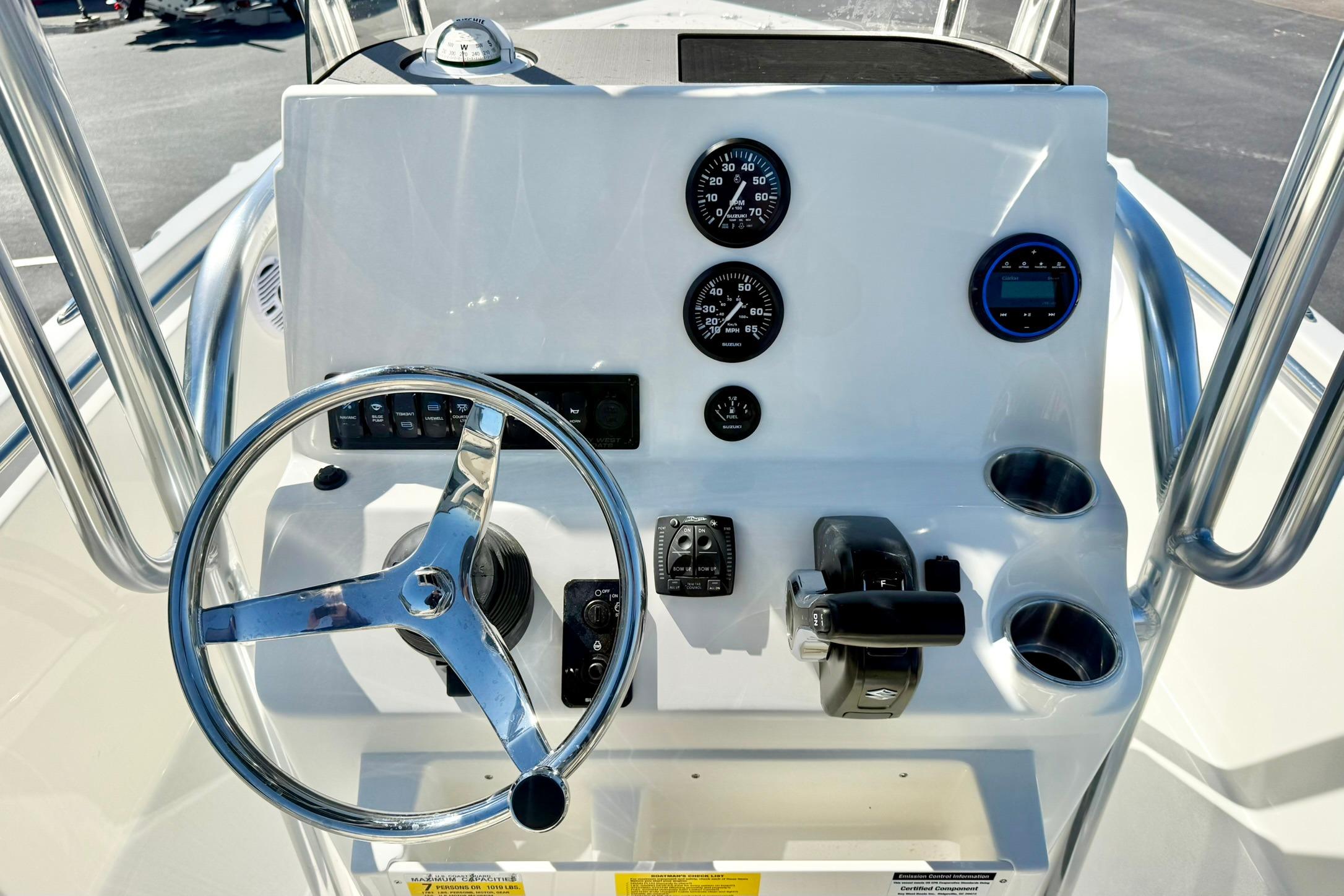 Steering console of 2026 Key West 189 FS boat with gauges and controls.