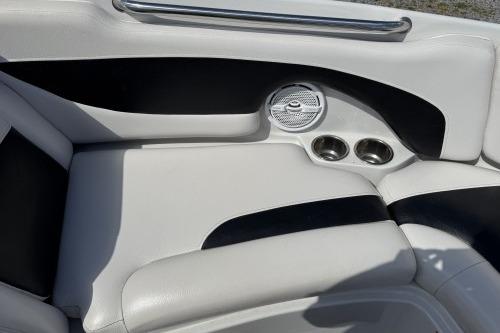 2012 Crownline 215 SS boat interior with speaker and cup holders.