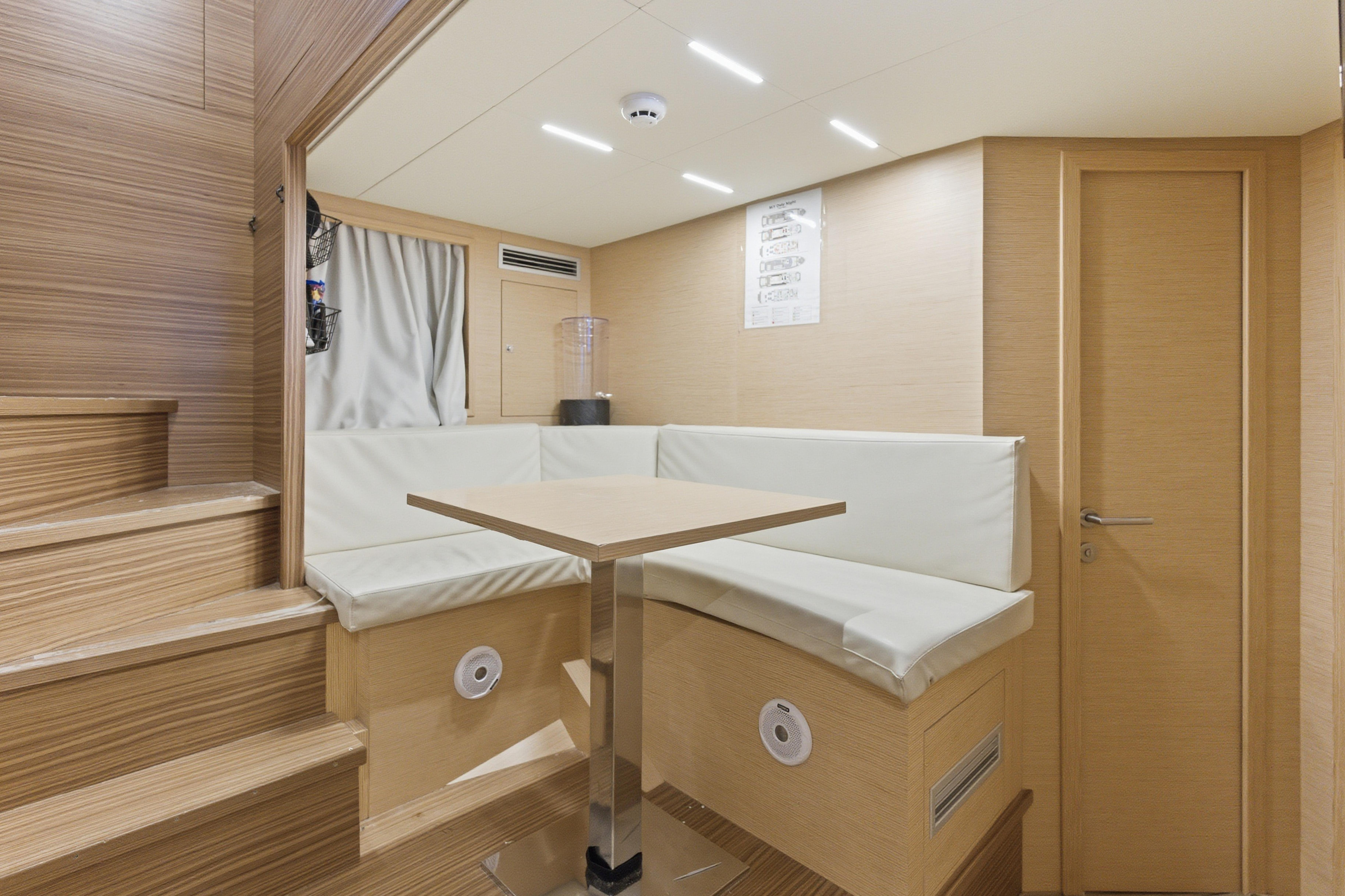 Luxurious interior of 2018 Ferretti Yachts 920 with modern seating and wooden finishes.