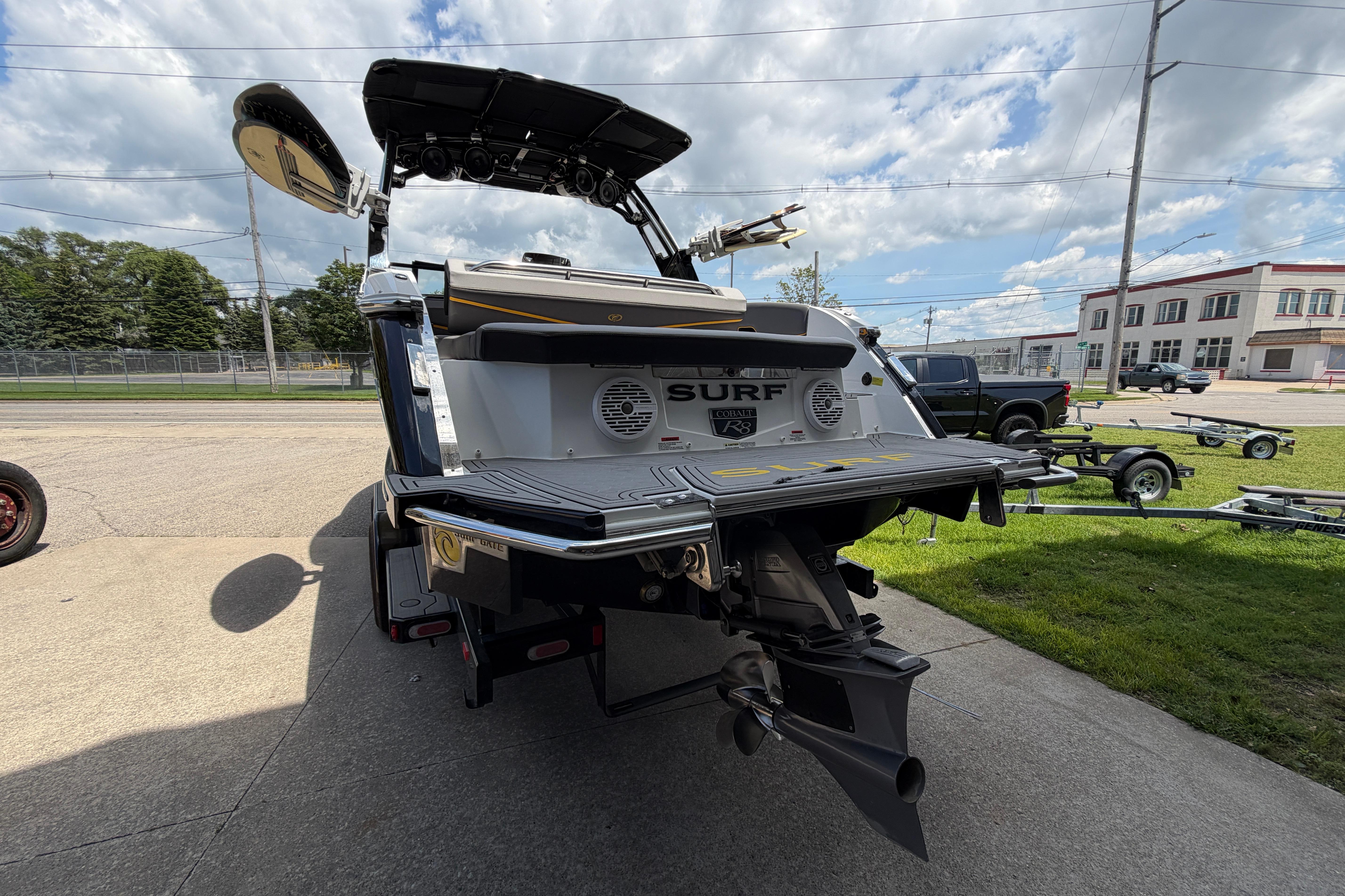 2021 Cobalt R8 Surf boat rear view, showcasing sleek design and advanced features.