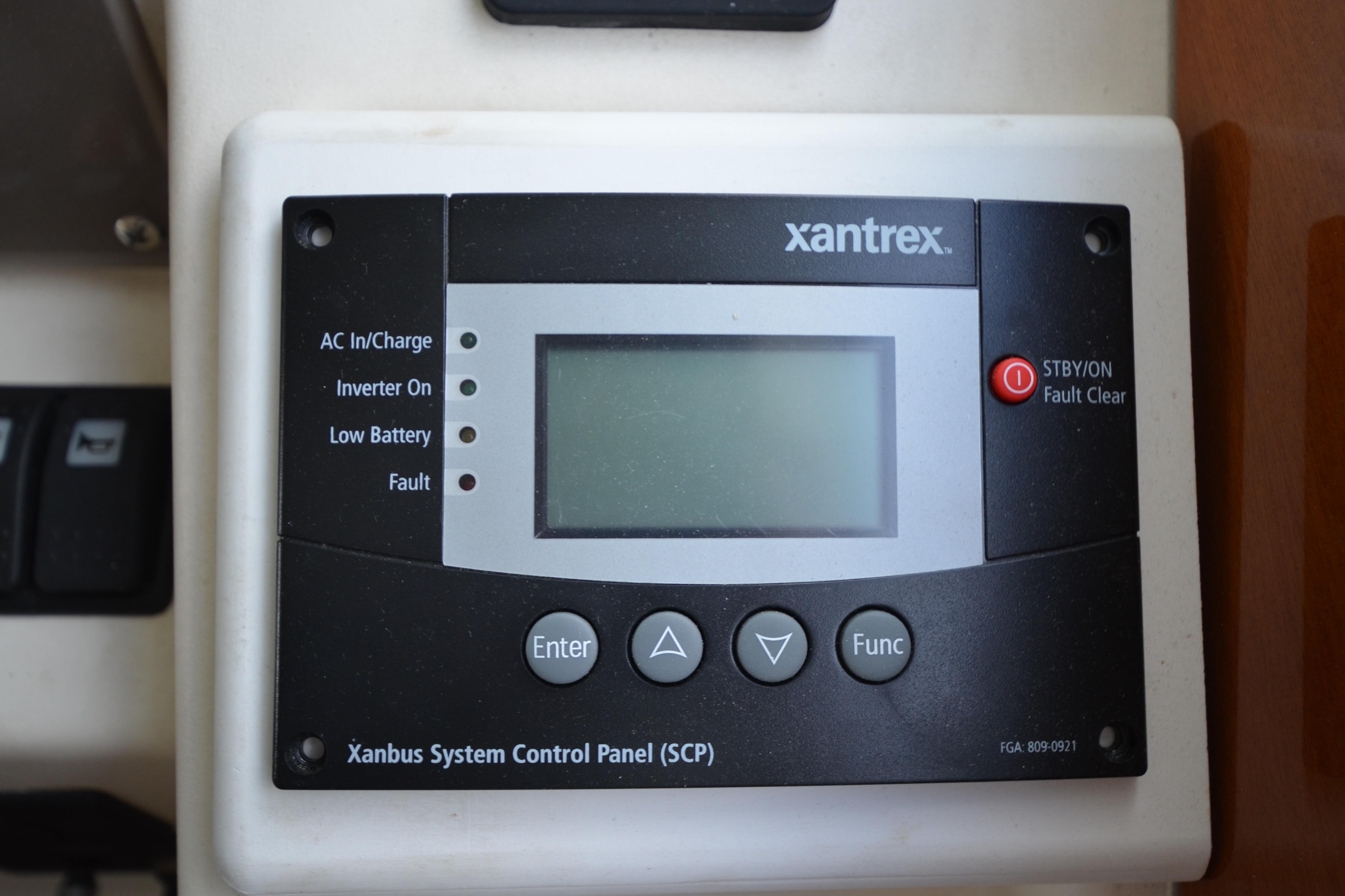 Xantrex control panel on 2007 Jeanneau Prestige 46 yacht, displaying system status indicators.