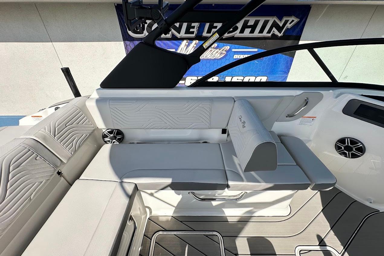 2026 Sea Ray SDX 230 Surf boat interior with sleek seating and modern design.