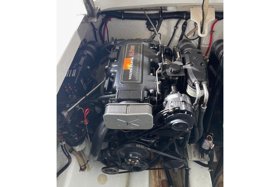 Engine compartment of a 1999 Formula 400 Super Sport boat, featuring a Volvo Penta engine.