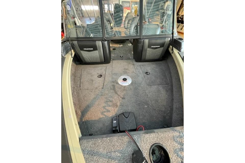 2026 Tracker Targa V-18 WT boat interior with carpeted flooring and seating area.