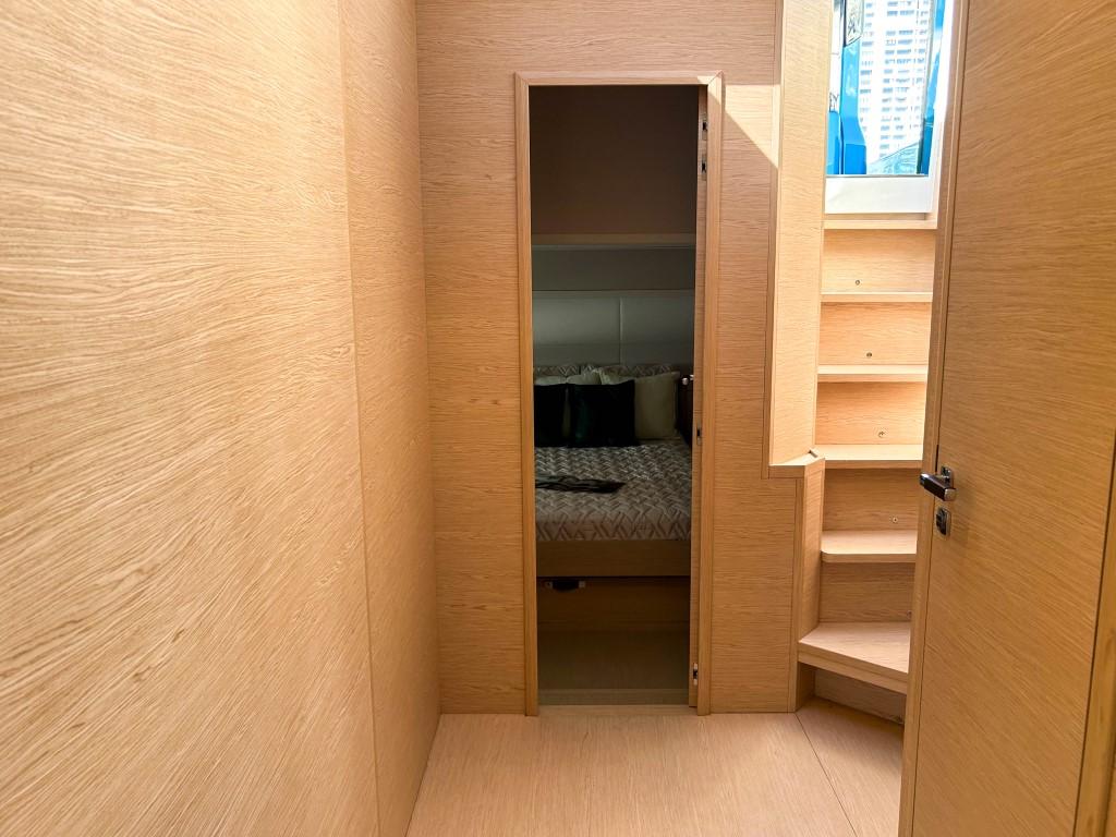 Interior cabin of 2024 Solaris Power 52 Open yacht with wooden finish and stairs.