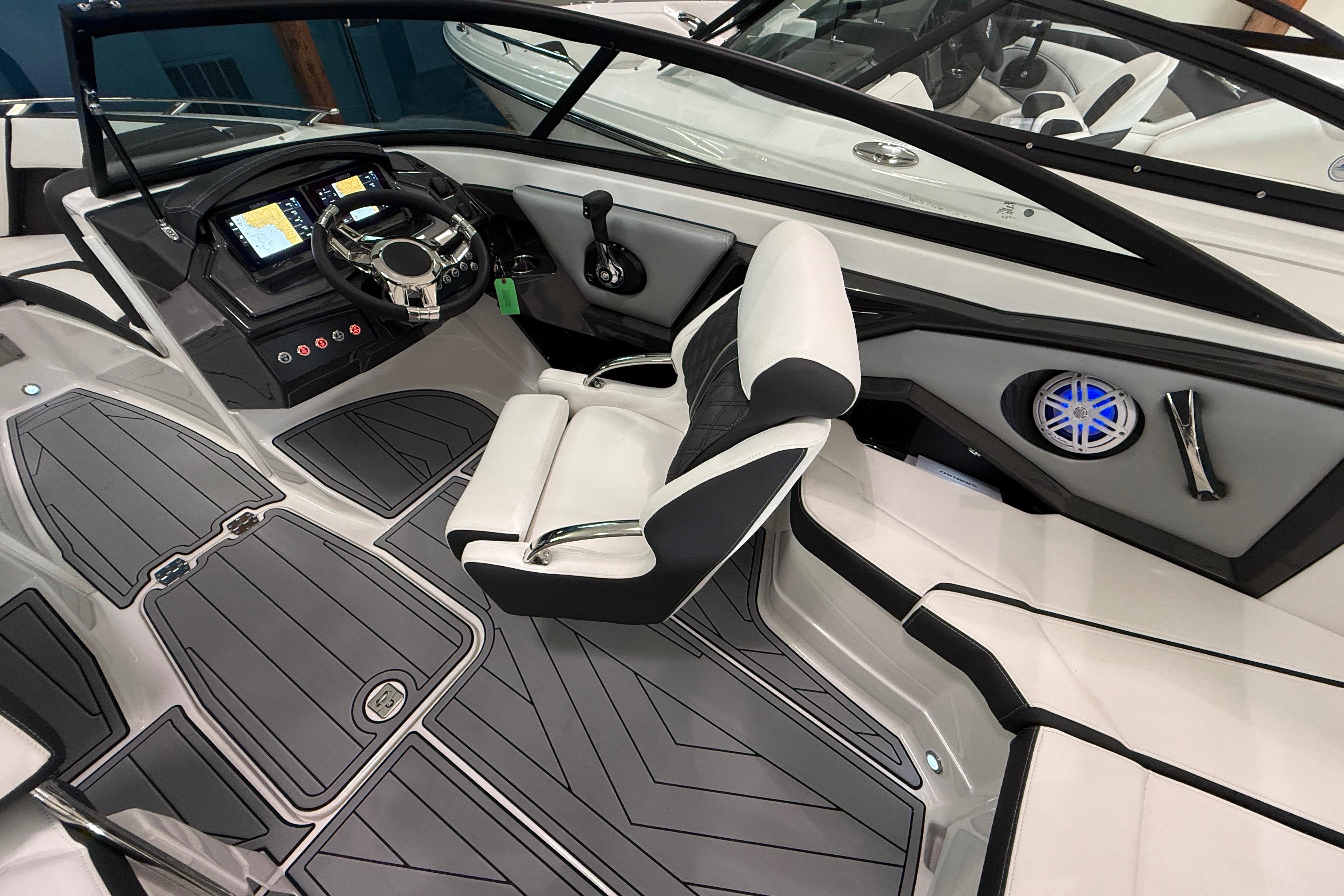 2025 Monterey 235SS Super Sport boat interior with modern dashboard and seating.
