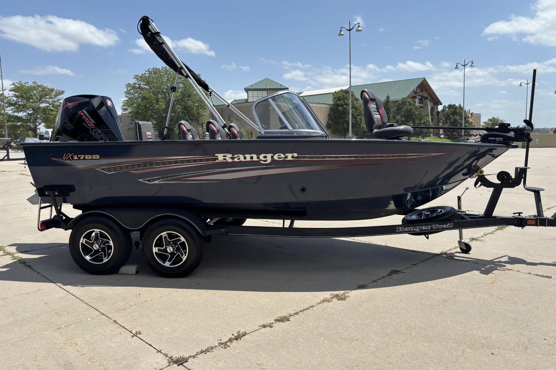 2021 Ranger VX1788 WT boat on trailer, parked outdoors under a clear sky.
