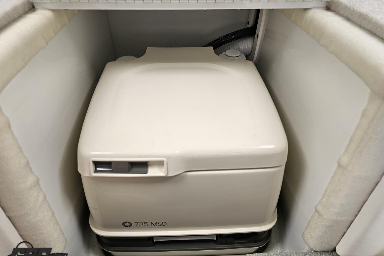 Portable toilet in 2005 Formula 271 FASTech boat cabin.