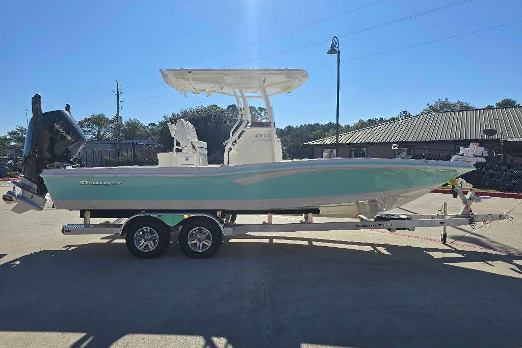 2025 Ranger 2510 Bay boat on trailer, parked outdoors under clear sky.