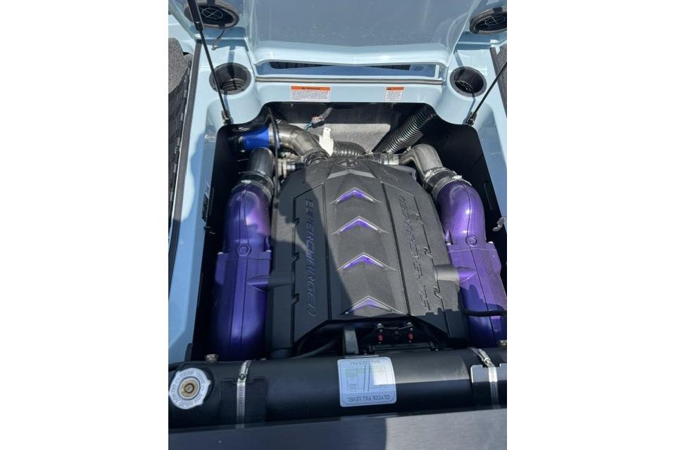 Engine of 2026 MasterCraft XStar 25 with purple accents and sleek design.