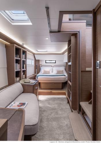 Luxurious interior of 2025 Lagoon 46 ICONIC yacht, featuring modern design and cozy furnishings.