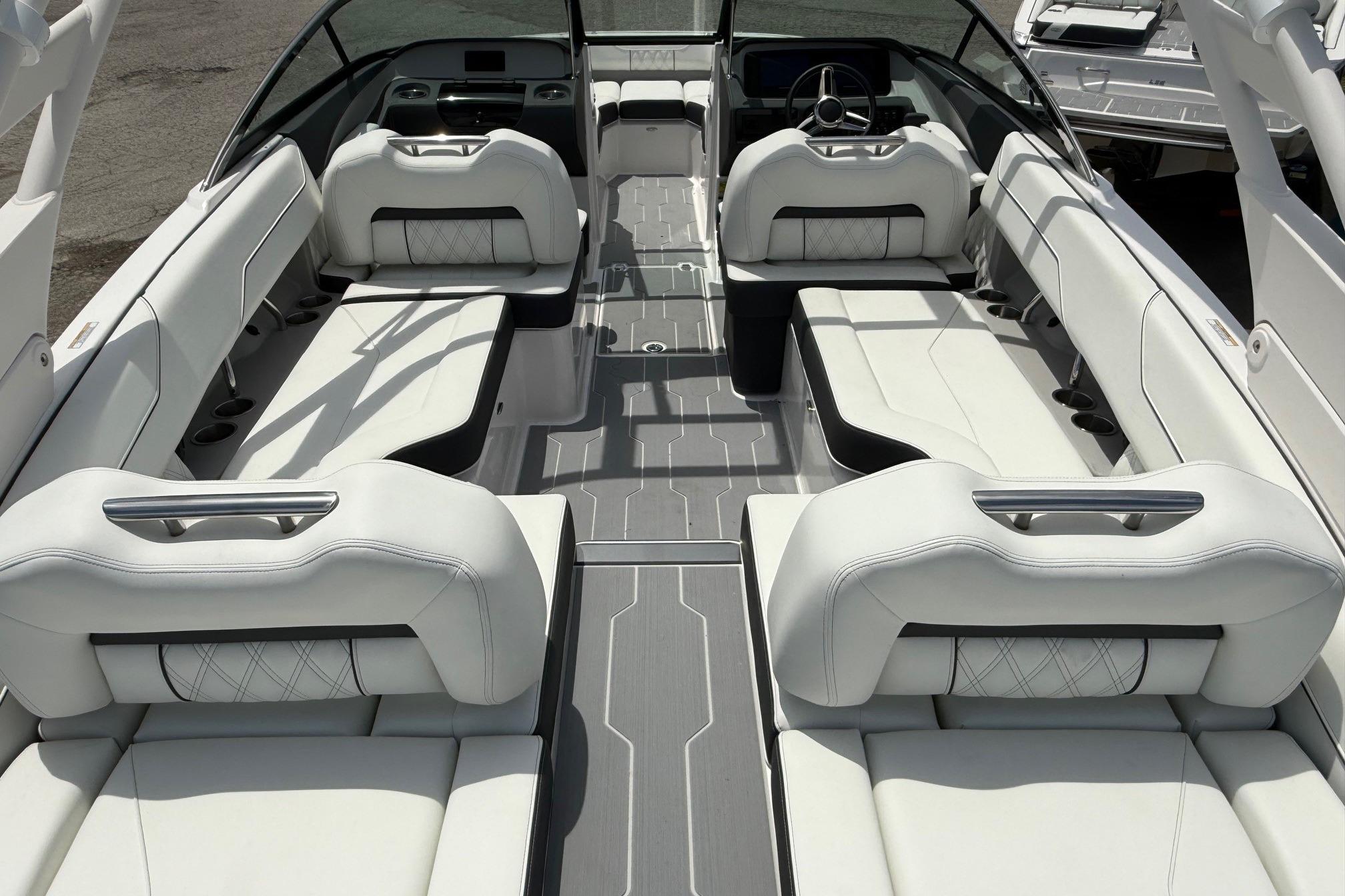 2026 Regal LS4 Surf boat interior with luxurious white seating and modern design.