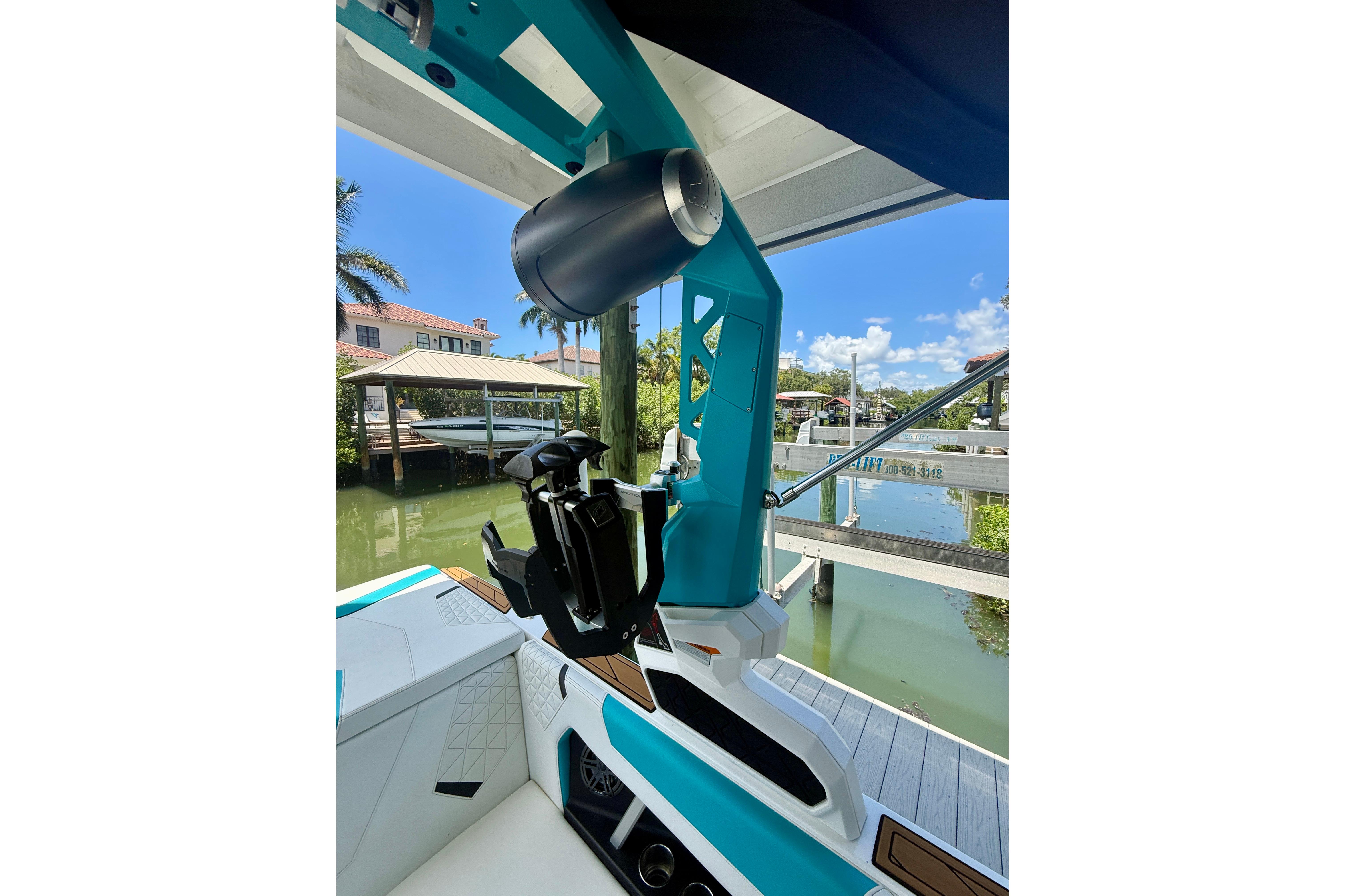 2024 Nautique Super Air Nautique GS20 boat interior with teal accents and speaker system.